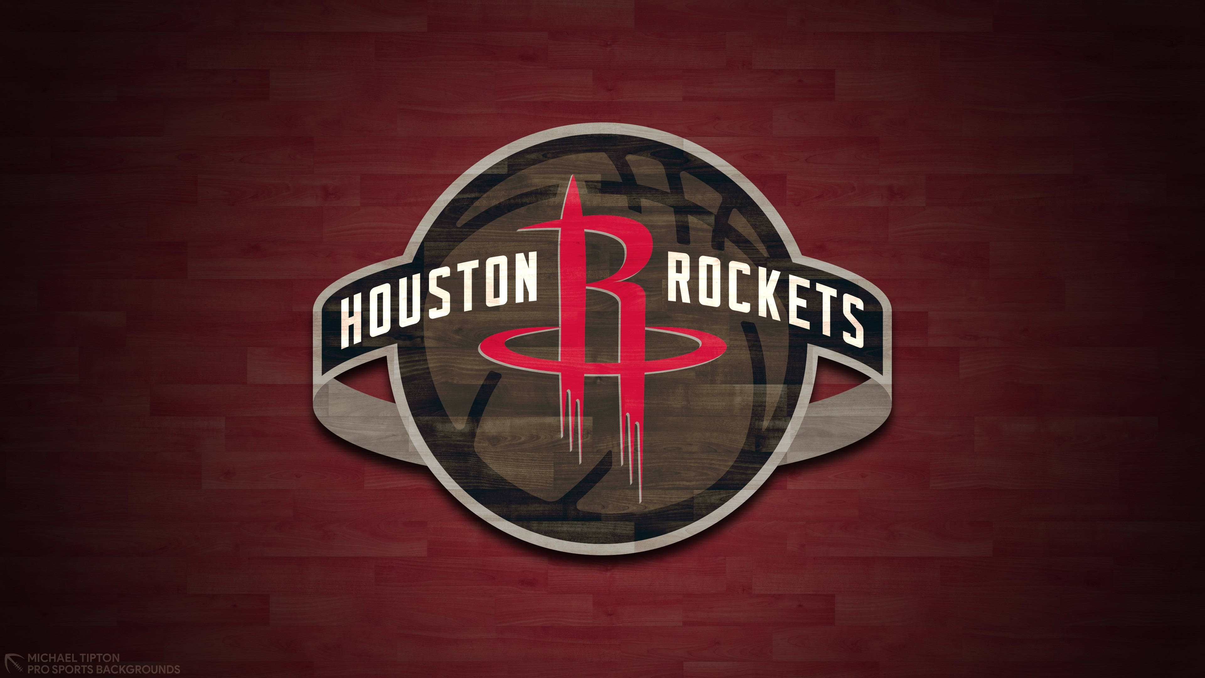 Houston Rockets 桌布 壁紙 — 休士頓火箭隊標誌居中於有紋理的栗色木地板背景上。