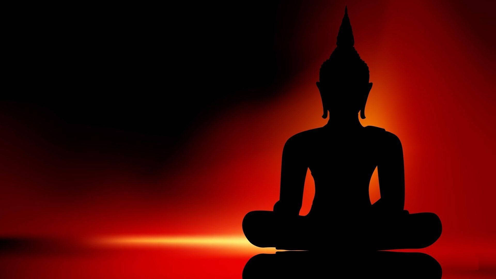 black buddha 桌布 壁紙 — 佛像剪影在熾熱的紅色夕陽背景下冥想。