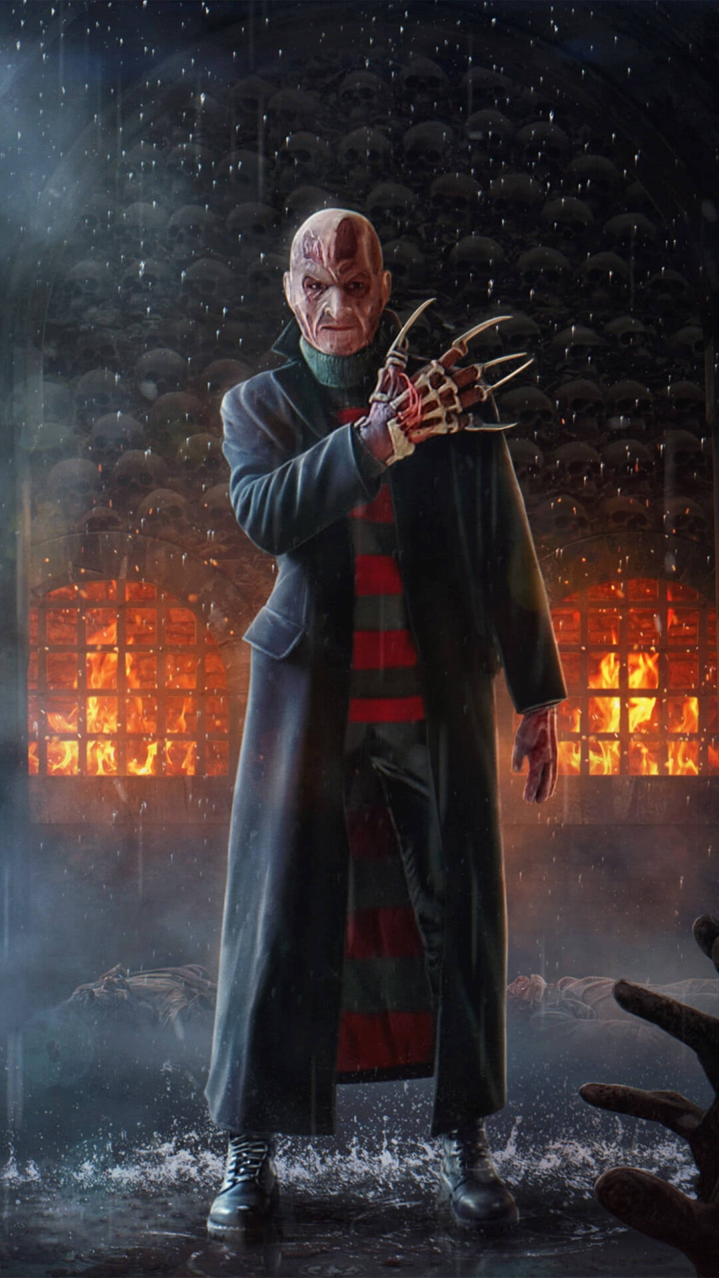 Freddy 桌布 壁紙 — 佛萊迪·克魯格在濕透的雨夜惡夢中威嚇地站立，身後是燃燒的窗戶，地面伸出骷髏手。