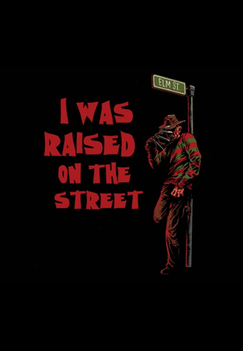 Freddy Krueger 桌布 壁紙 — 佛萊迪·克魯格站在一個 Elm St 標誌旁，黑色背景上以粗體紅字寫著「我在街上長大」，顯得咄咄逼人。