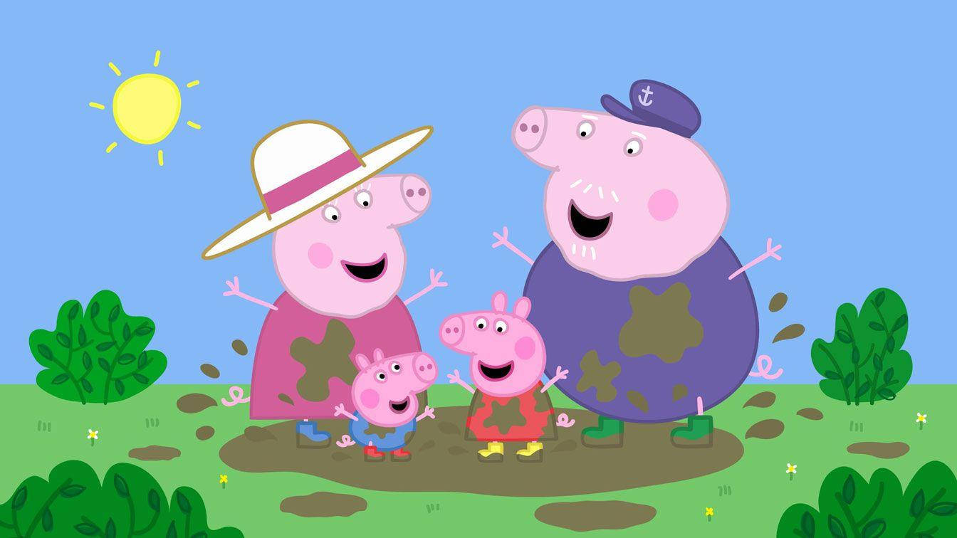 peppa pig desktop 桌布 壁紙 — 佩佩豬一家在明亮的陽光下，於綠色的田野中與灌木叢一起快樂地沾滿泥巴。