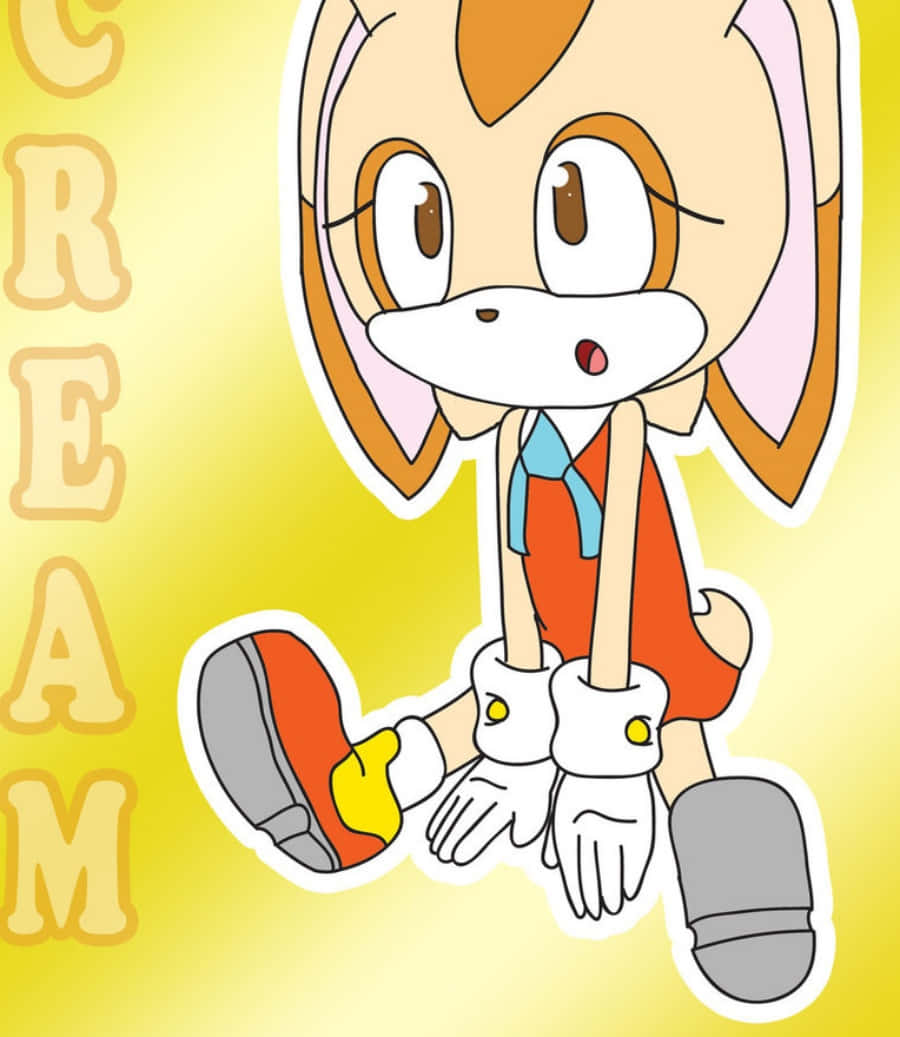 Cream The Rabbit 桌布 壁紙 — 來自音速小子的 Cream the Rabbit 愉快地坐在明亮的黃色漸變背景前，她的名字垂直地設計在旁邊。