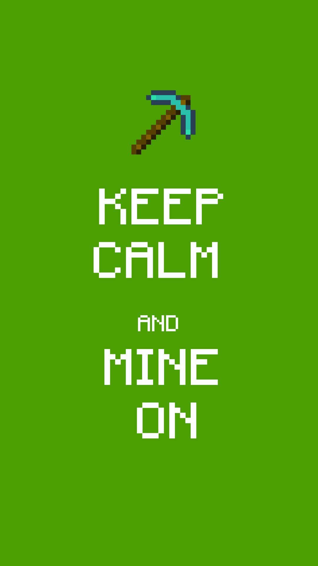 我的世界 桌布 壁紙 — 像素化Minecraft鎬，上方有粗體白色文字「KEEP CALM AND MINE ON」，背景為純綠色。