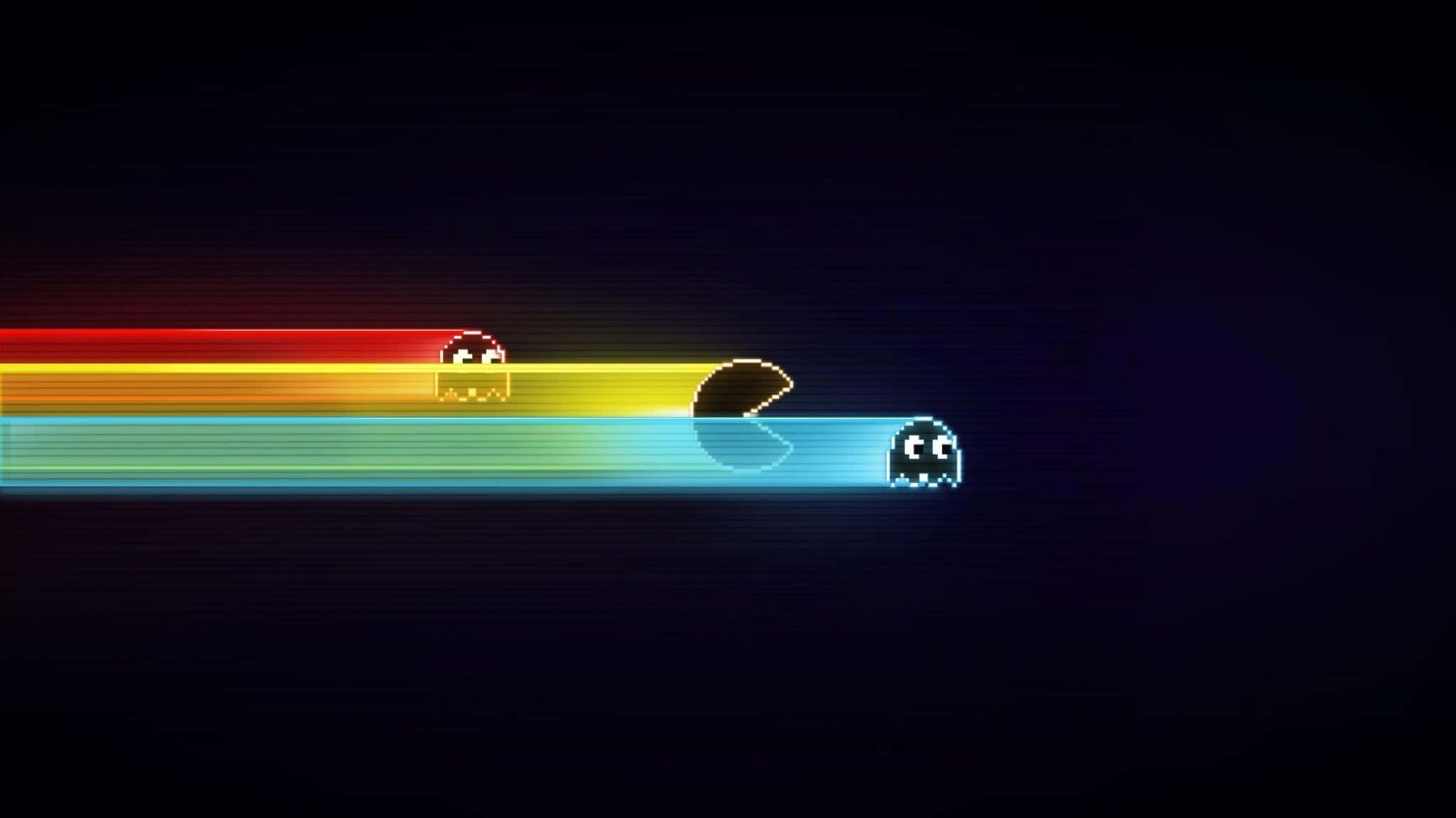 2048x1152 桌布 壁紙 — 像素化的 Pacman 和鬼魂在黑暗背景上沿著一條充滿活力的彩虹軌跡滑行。