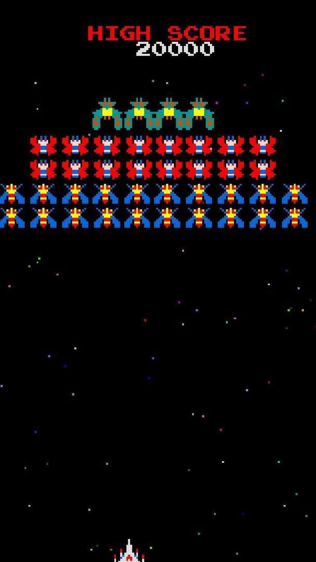 arcade 桌布 壁紙 — 像素太空船在經典街機遊戲中對抗外星侵略者，背景是星空。