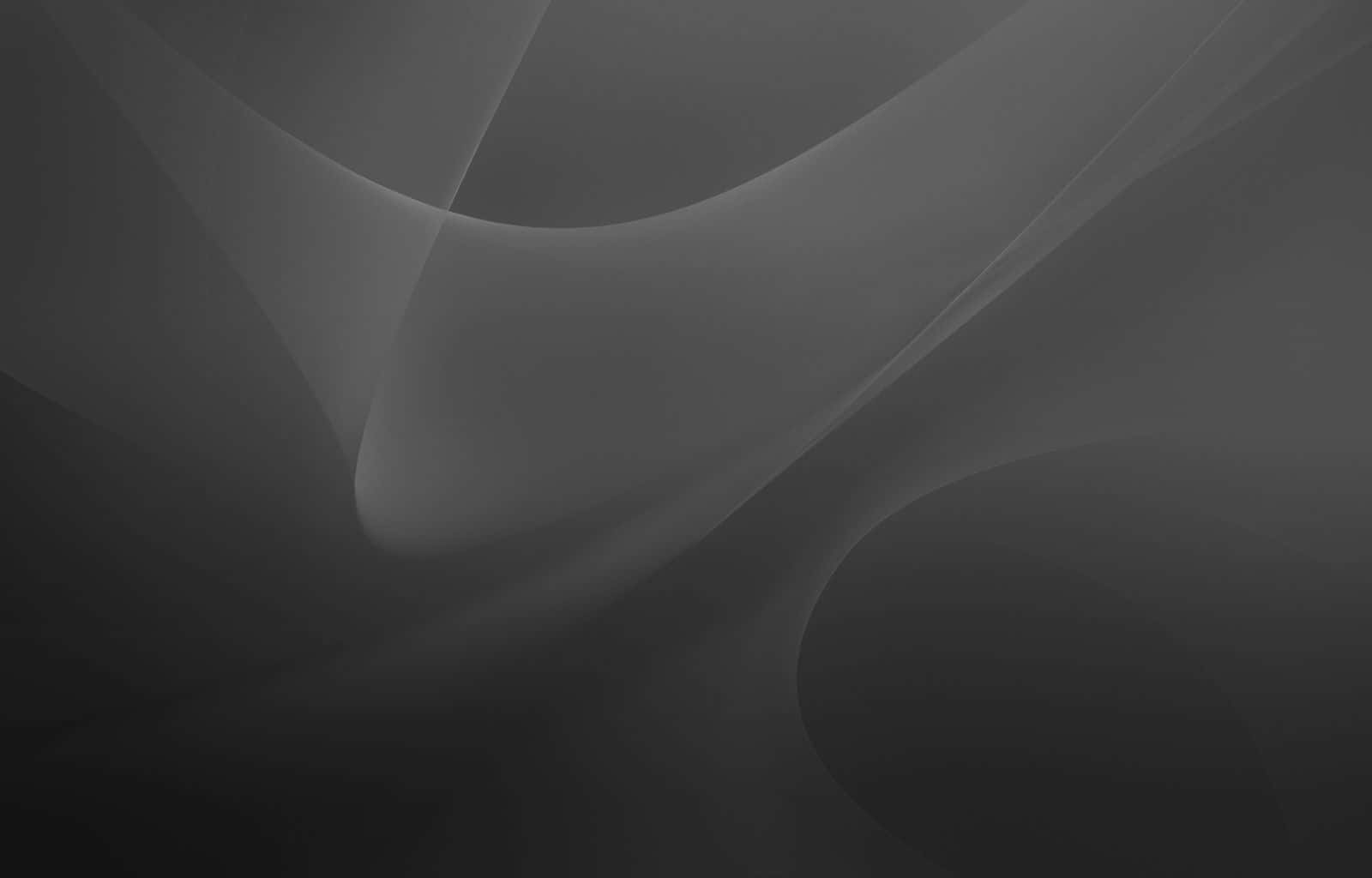 Dark Grey 桌布 壁紙 — 優雅流動的灰色抽象形態，以柔和漸變和流暢曲線營造寧靜簡約的構圖。