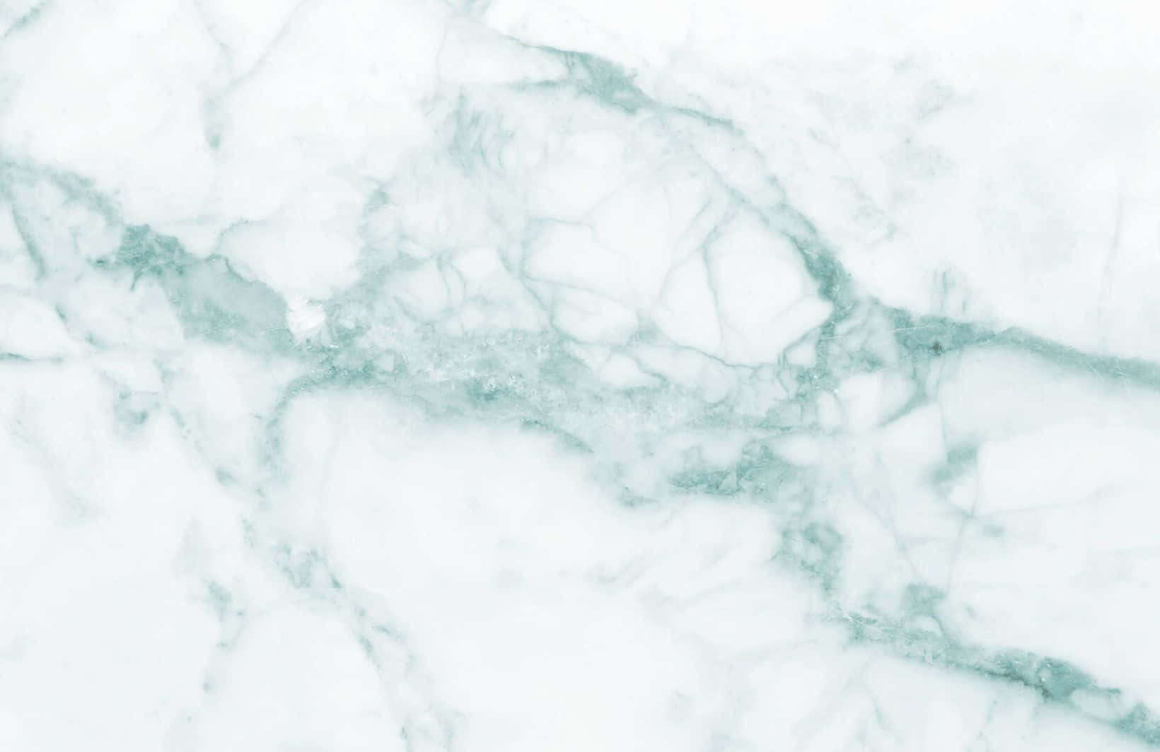 Green Marble 桌布 壁紙 — 優雅白色大理石的特寫，帶有柔和青綠色紋理，營造出奢華的自然圖案。