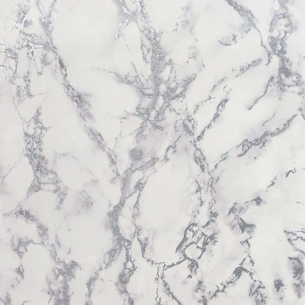 Grey Marble 桌布 壁紙 — 優雅白色大理石的特寫，帶有複雜的灰色紋理和微妙的閃爍質感。