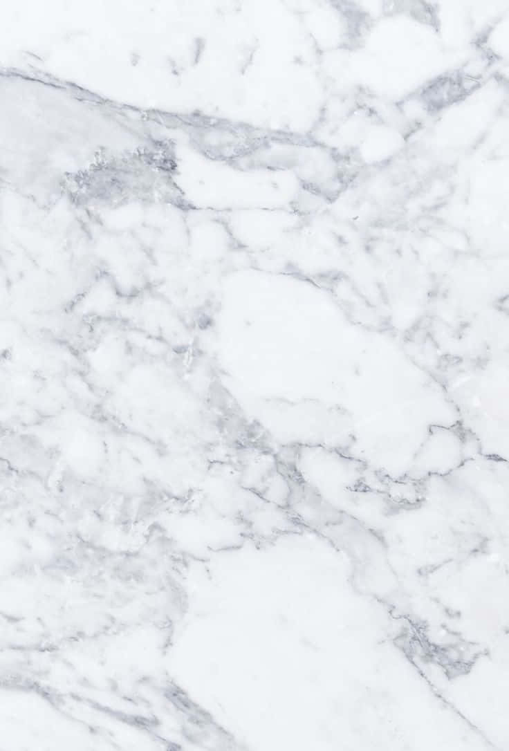 Marble iPad 桌布 壁紙 — 優雅白色大理石的近距離特寫，帶有複雜的灰色紋理和細微質感。