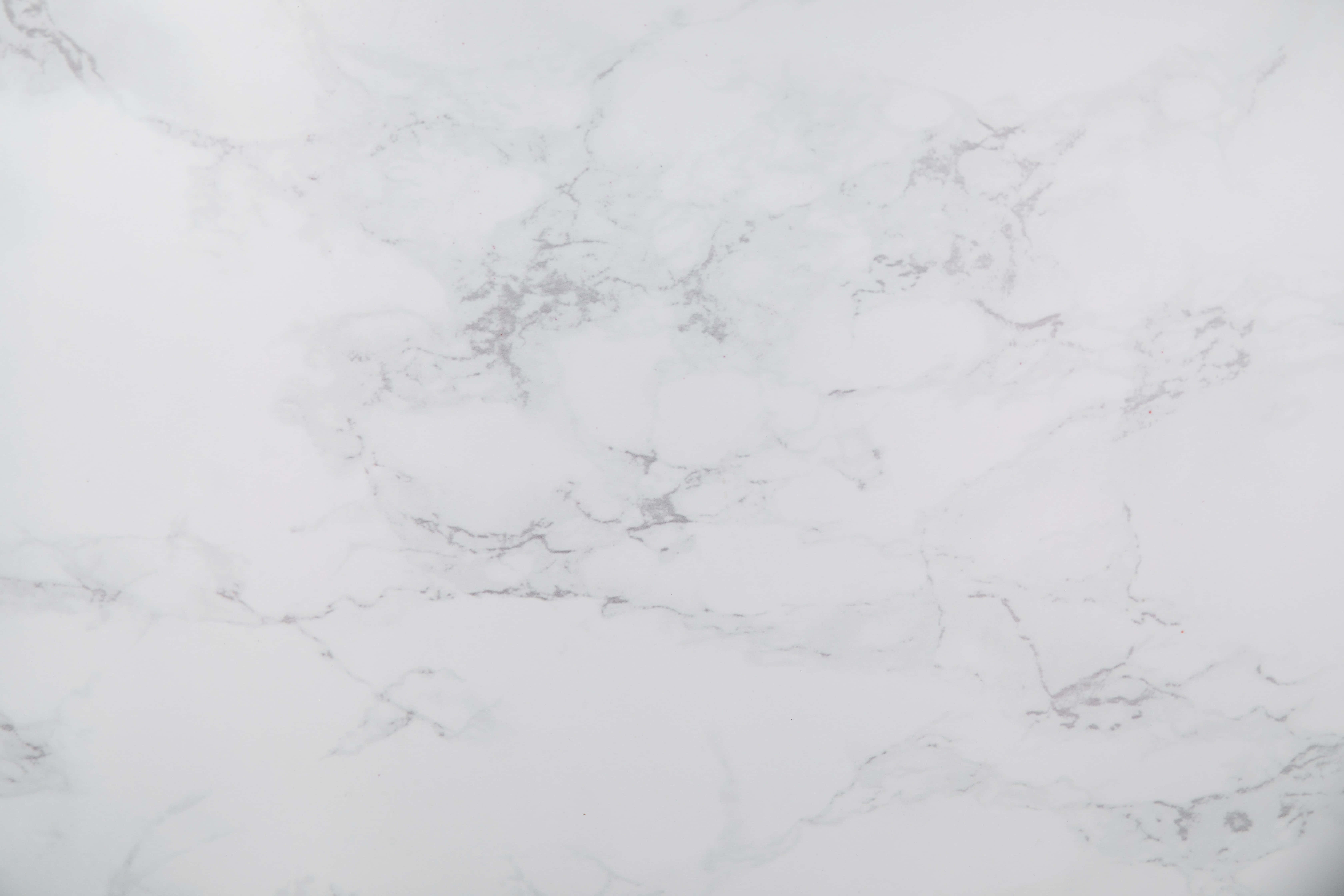 White Marble 桌布 壁紙 — 優雅白色大理石的近距離特寫，帶有微妙的灰色紋理和柔和自然圖案。