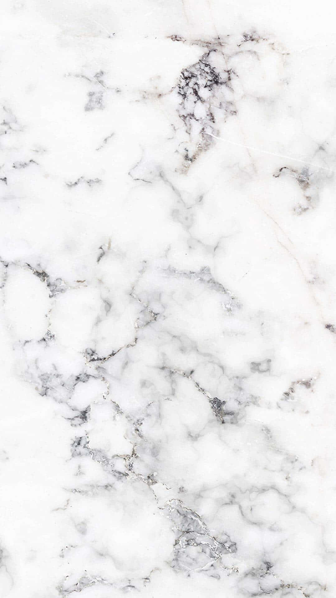 Best Marble 桌布 壁紙 — 優雅白色大理石的近距離特寫，帶有漩渦狀灰色和細微粉紅色紋理，營造出奢華的自然圖案。