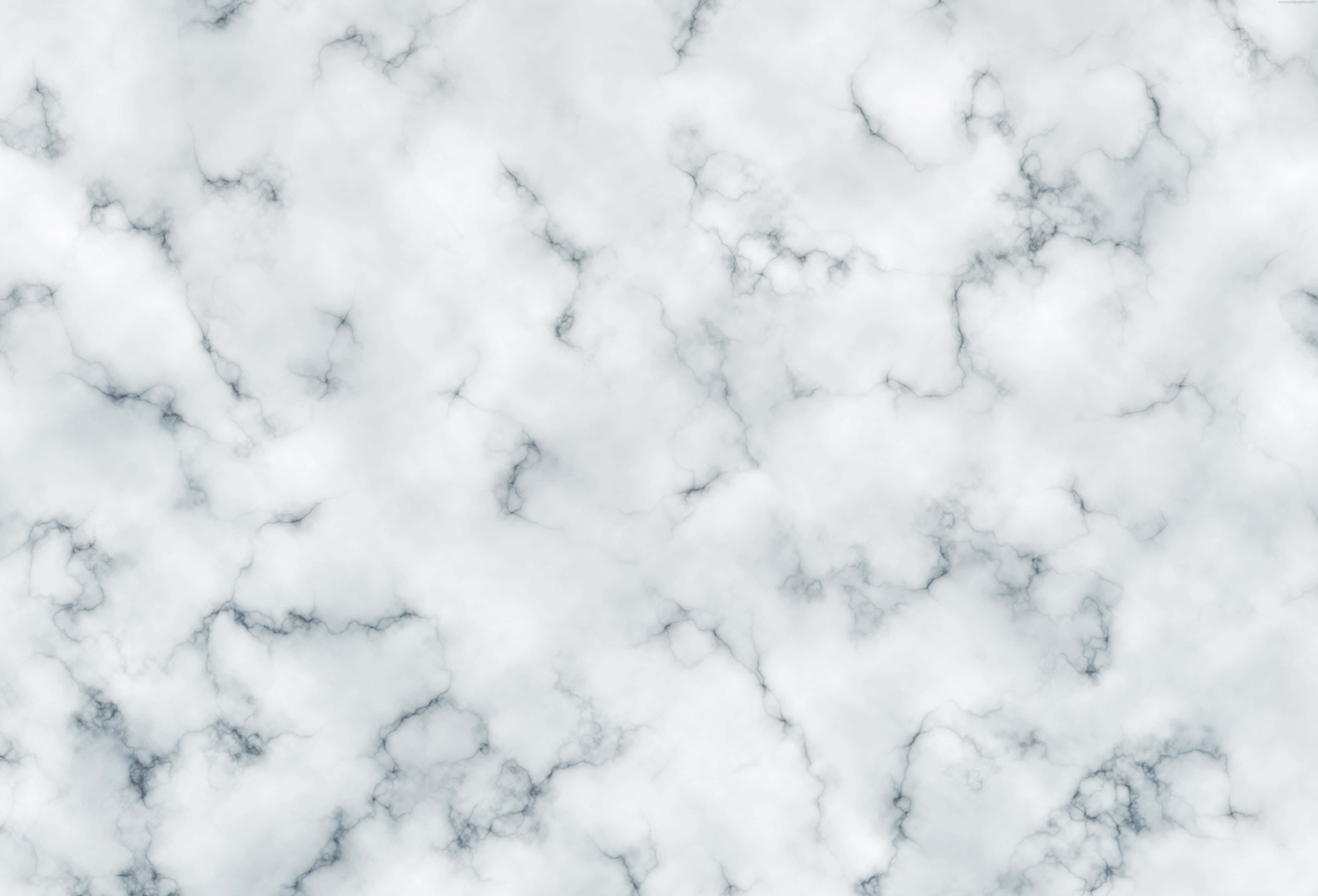 White Marble 桌布 壁紙 — 優雅白色大理石的近距離特寫，帶有漩渦狀灰色紋理，營造出奢華的自然圖案。