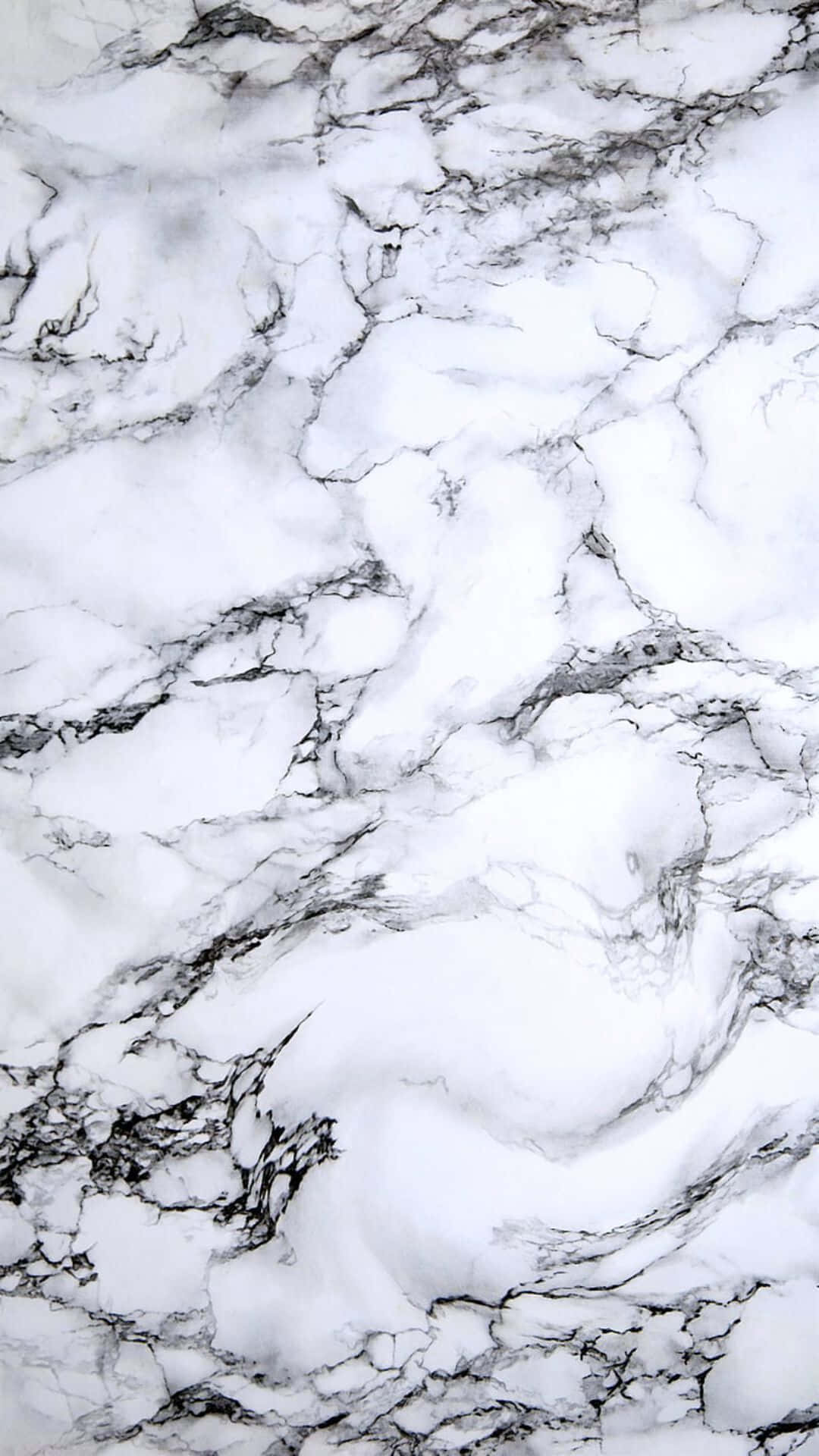 Marble iPad 桌布 壁紙 — 優雅白色大理石的近距離特寫，表面有有機圖案流動的大膽黑色紋理。