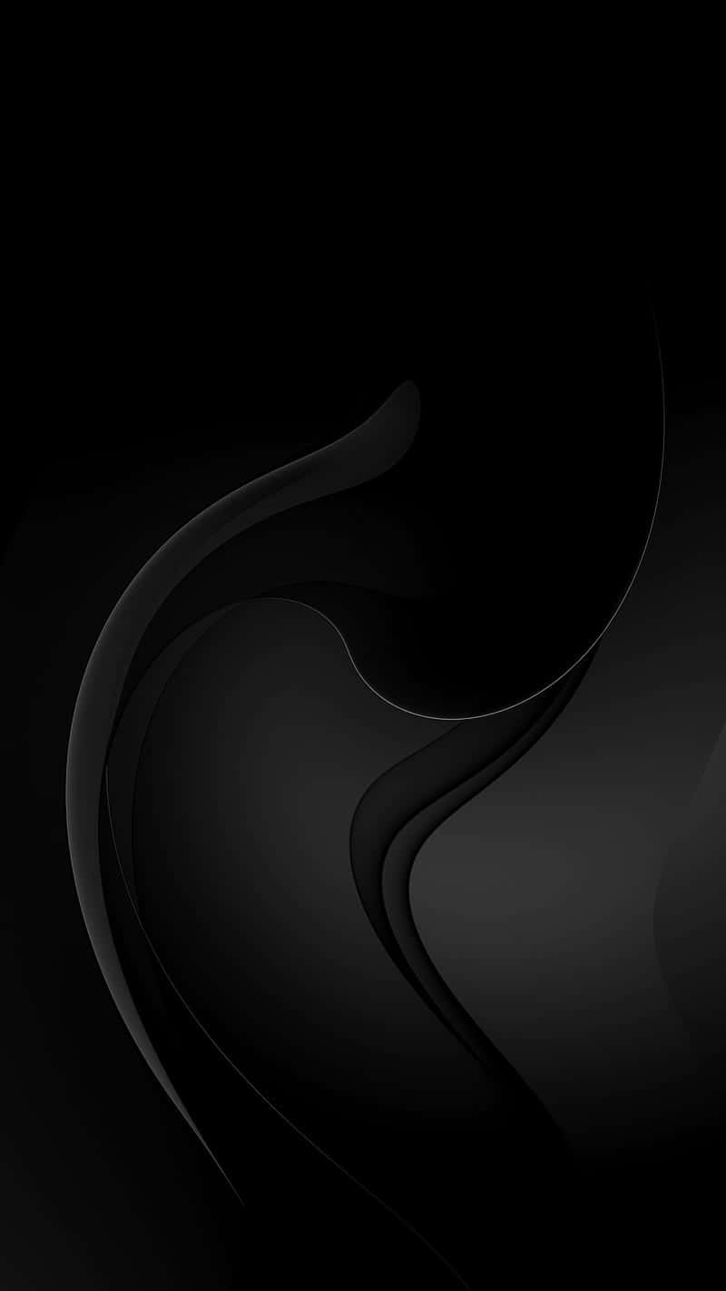 AMOLED 桌布 壁紙 — 優雅的抽象黑色漩渦在深邃陰影的畫布上滑動，營造出極簡現代美學。
