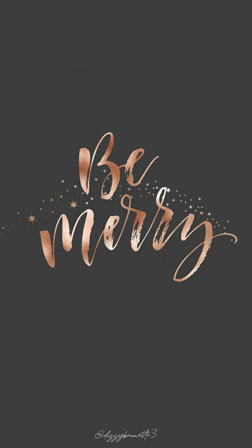 可愛聖誕風格 桌布 壁紙 — 優雅的玫瑰金色草書文字寫著「Be Merry」，在深灰色背景上綴以閃爍星星。