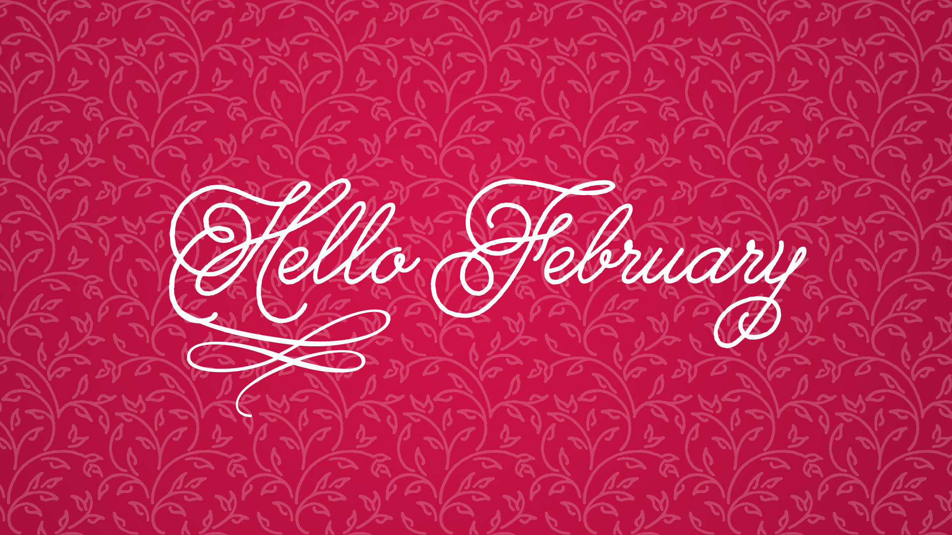 二月 桌布 壁紙 — 優雅的白色草書文字寫著 Hello February，背景是豐富的紅色，帶有精緻的花卉藤蔓圖案。