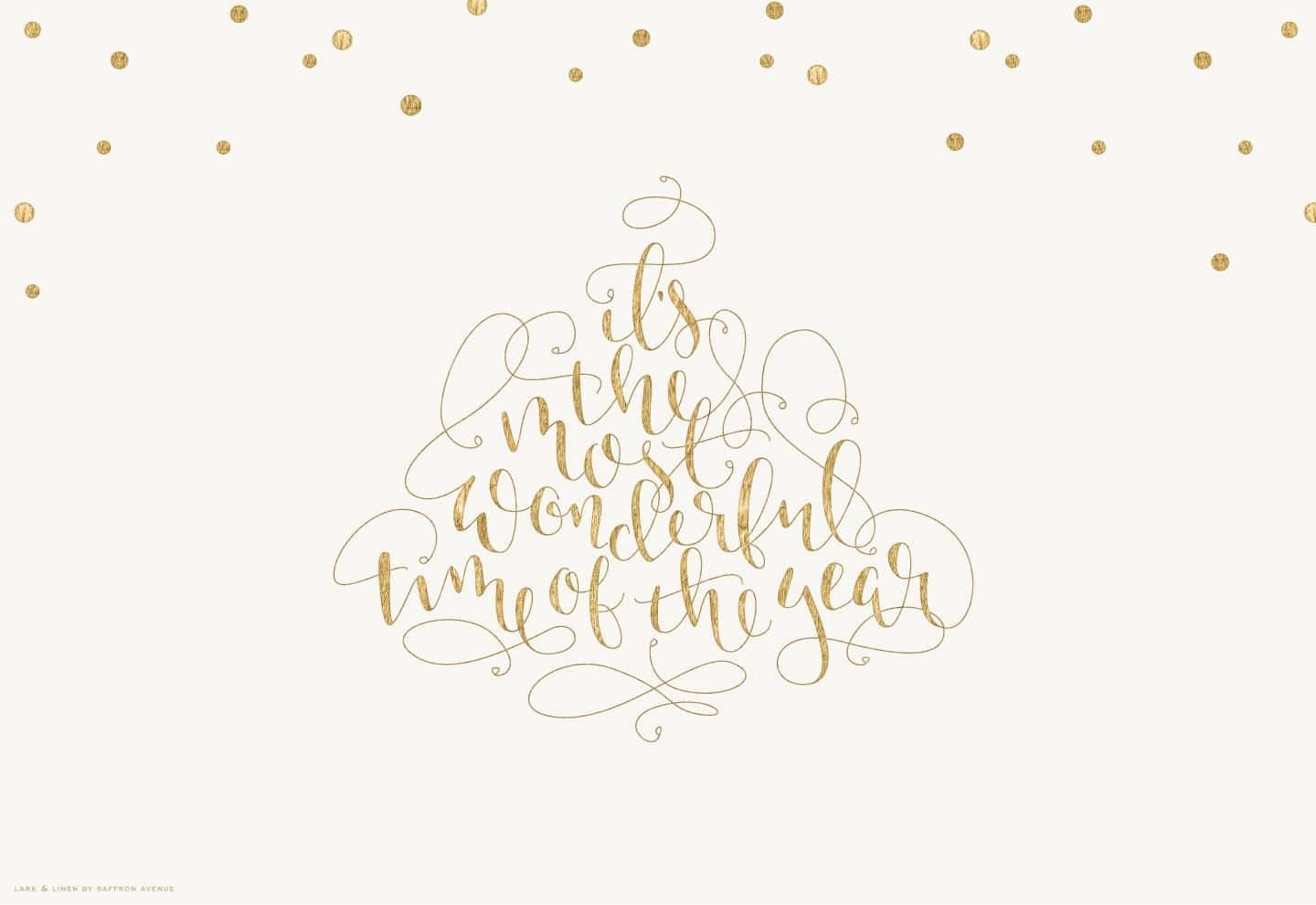 Gold And White 桌布 壁紙 — 優雅的金色書法拼出「這是一年中最美好的時光」，形狀像聖誕樹，奶油色背景上散落著金色圓點。