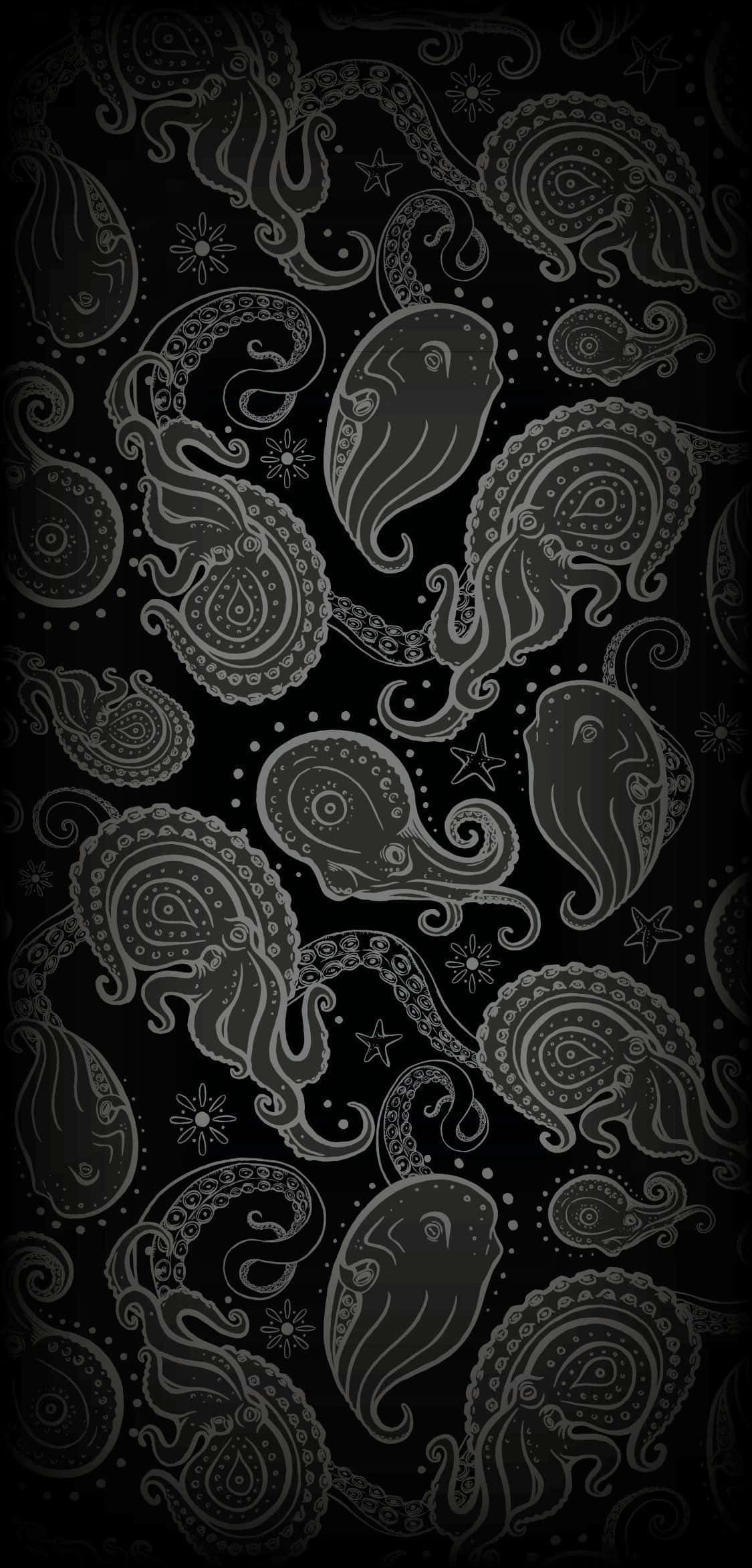 Paisley 桌布 壁紙 — 優雅的銀色佩斯利和星星圖案在深黑色背景上重複旋轉，形成裝飾性圖案。