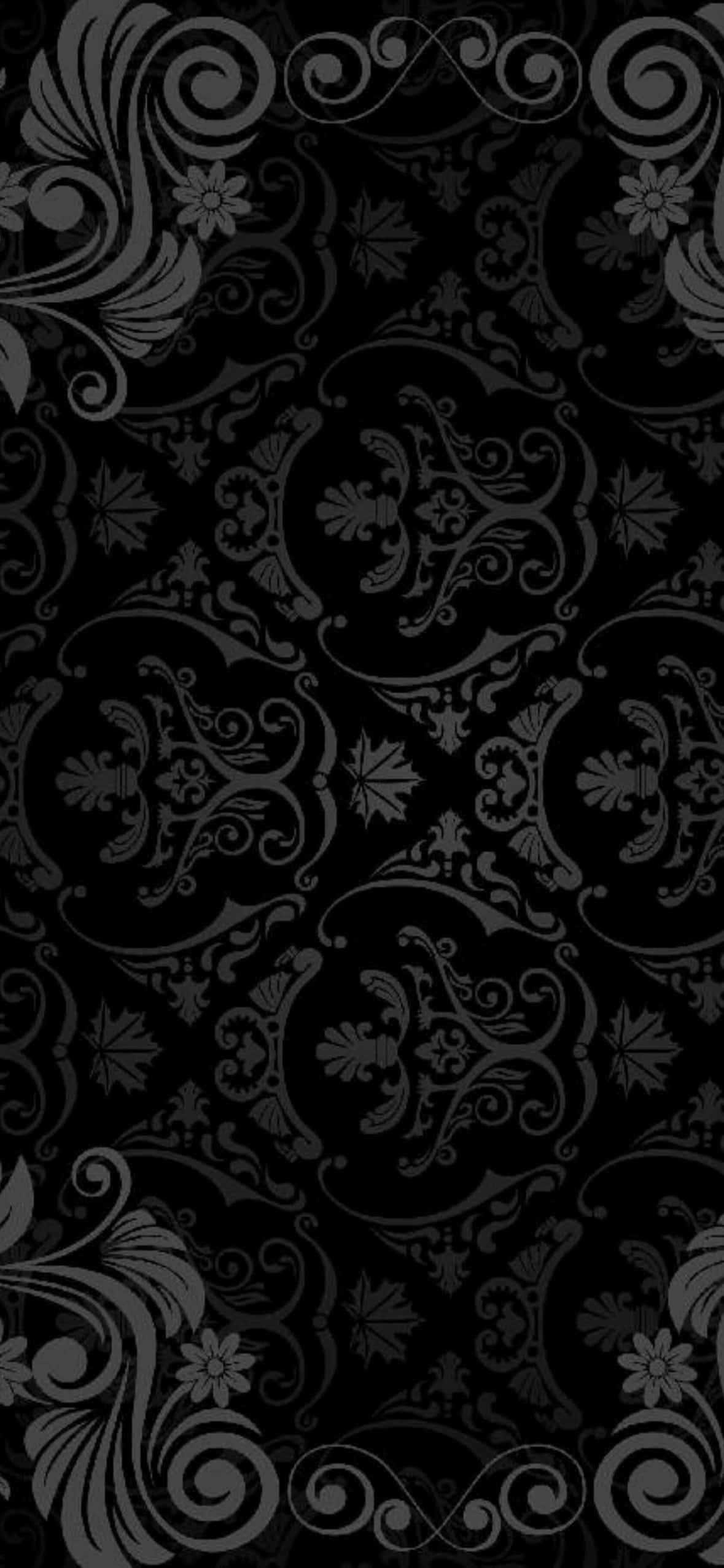 1179x2556 桌布 壁紙 — 優雅的黑灰色大馬士革壁紙，表面重複著複雜的漩渦花卉和葉子圖案。