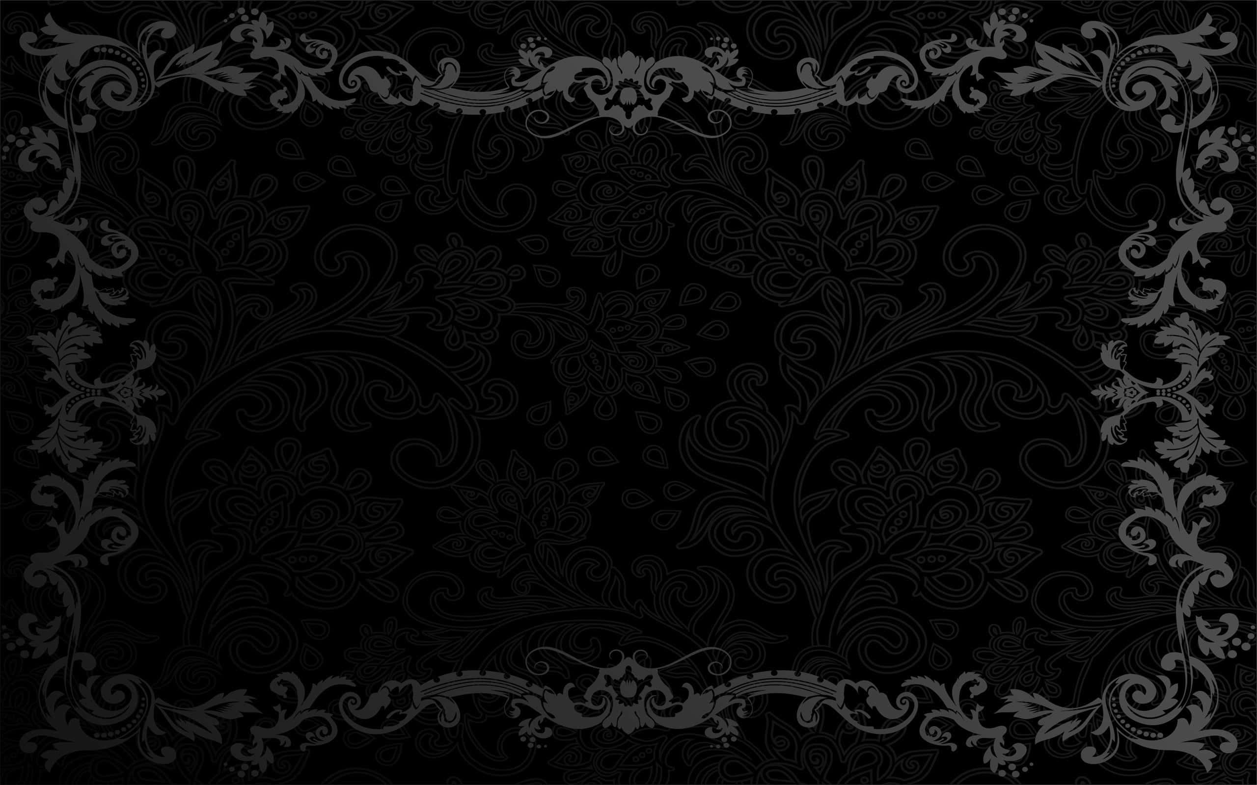 Lace 桌布 壁紙 — 優雅的黑色壁紙，在深色背景上帶有精緻的銀色花絲邊框和花卉圖案。