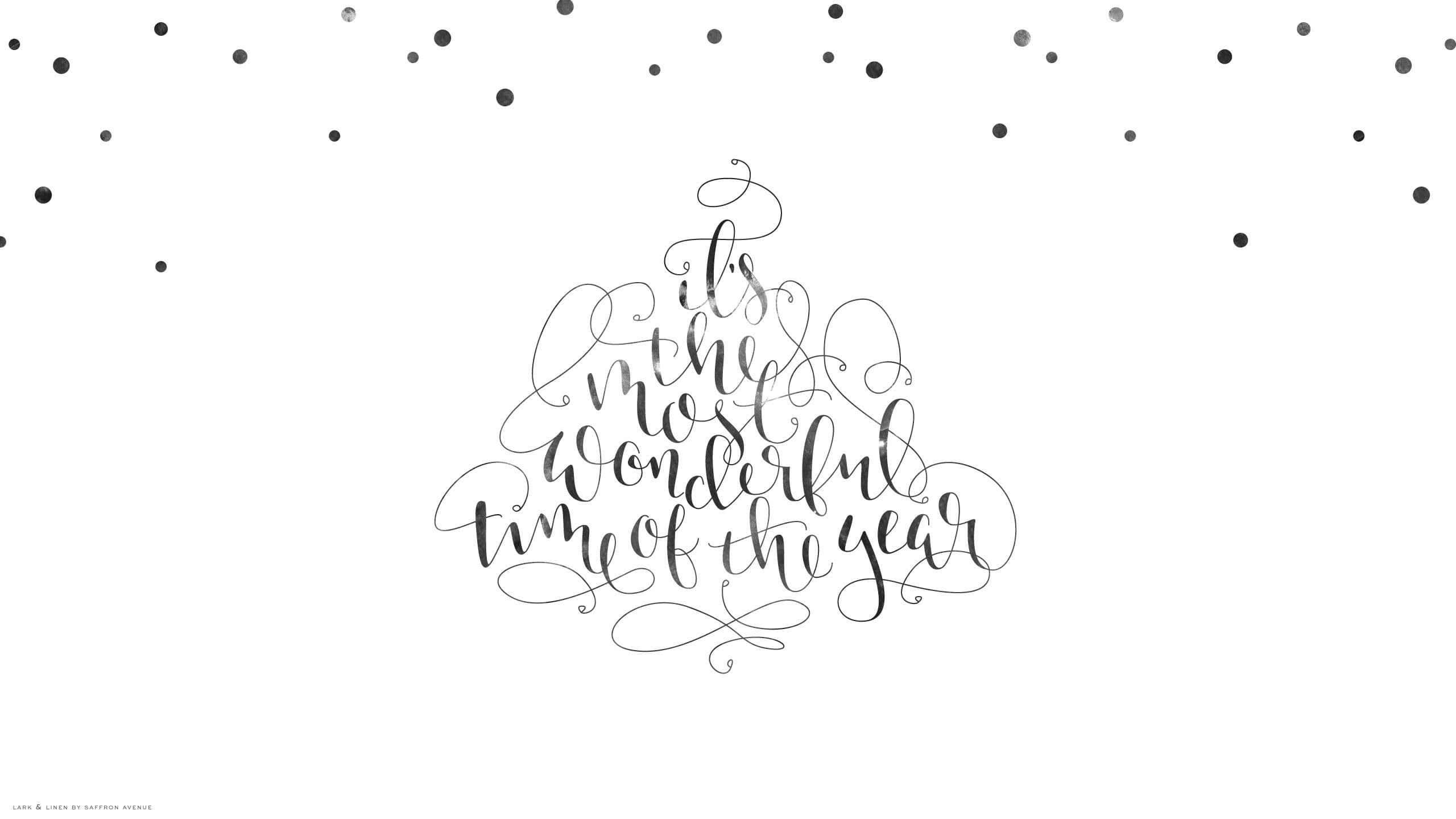 Boho Christmas 桌布 壁紙 — 優雅的黑色書法拼出「這是一年中最美好的時光」，形狀像聖誕樹，上方有散落的點點。
