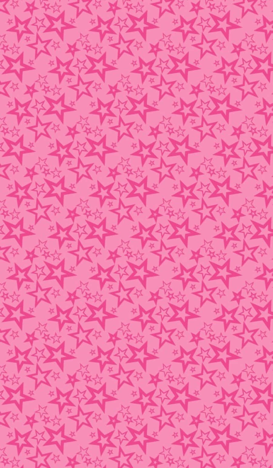 Pink Stars 桌布 壁紙 — 充滿不同深淺散落星星形狀的鮮豔粉紅色壁紙，營造出俏皮圖案。