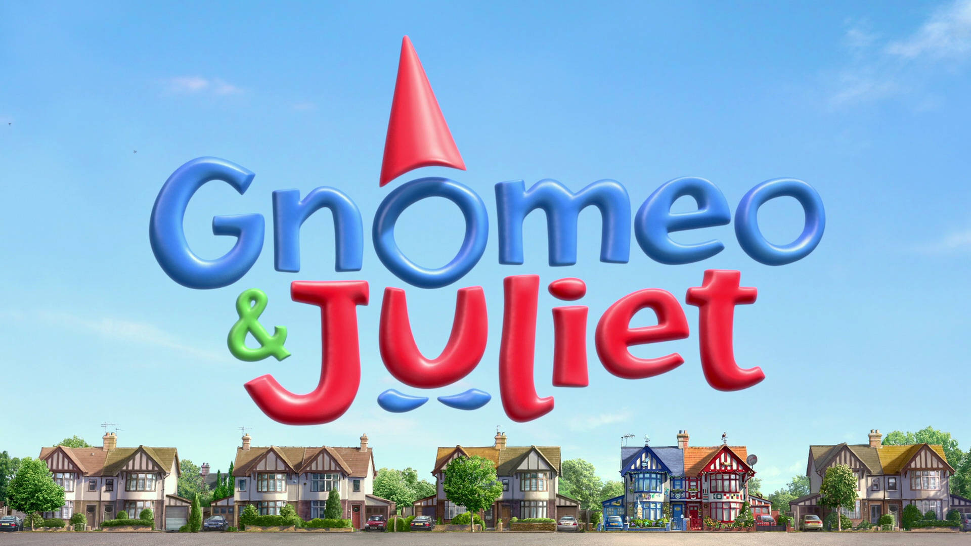 3D 桌布 壁紙 — 充滿活力的 3D 動畫標題「Gnomeo & Juliet」漂浮在一排色彩繽紛的都鐸風格房屋上方，背景是晴朗的藍天。