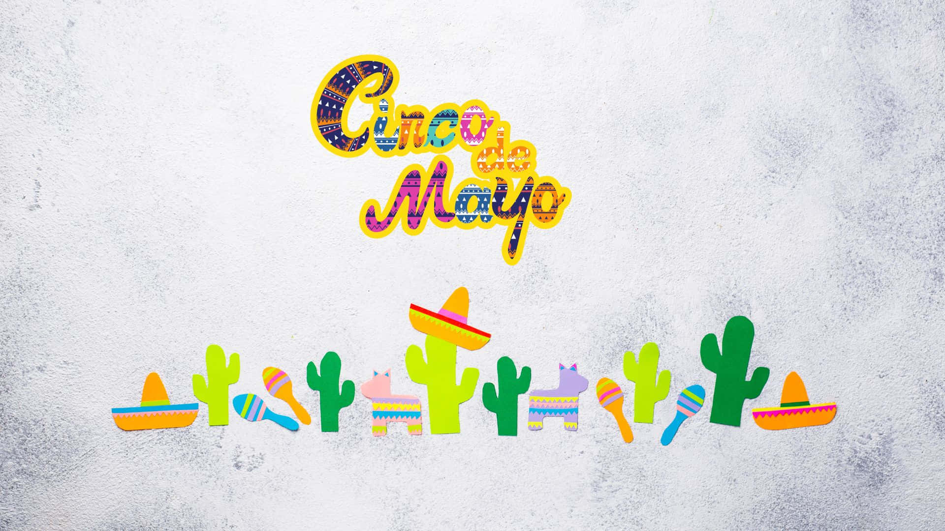 Cinco De Mayo 桌布 壁紙 — 充滿活力的 Cinco de Mayo 慶祝圖案，包括色彩繽紛的墨西哥闊邊帽、仙人掌和沙槌，背景為紋理灰色。