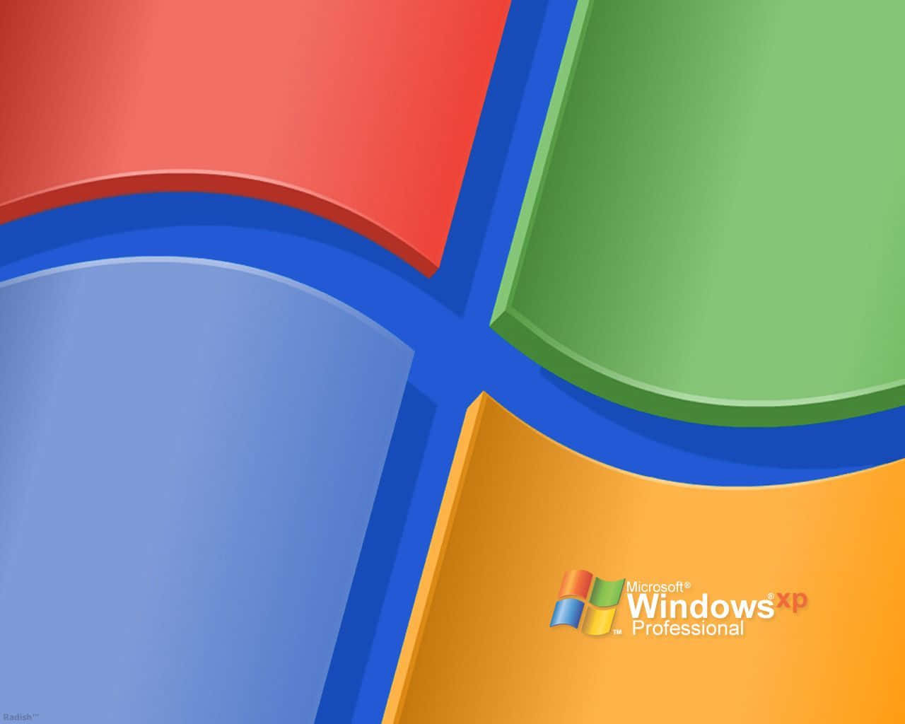  壁紙 — 充滿活力的Windows XP標誌，帶有紅色、綠色、藍色和黃色面板，採用光澤3D渲染設計。