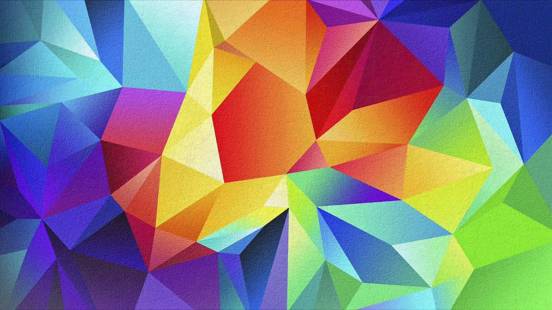 Shapes 桌布 壁紙 — 充滿活力的低多邊形幾何形狀以彩虹色調形成動態抽象構圖，表面帶有紋理。