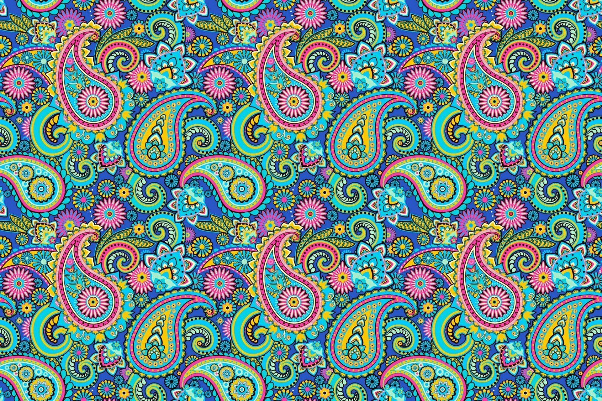 Paisley 桌布 壁紙 — 充滿活力的佩斯利花紋壁紙，帶有漩渦狀水滴形狀和電光藍、粉紅和黃色的花卉圖案。