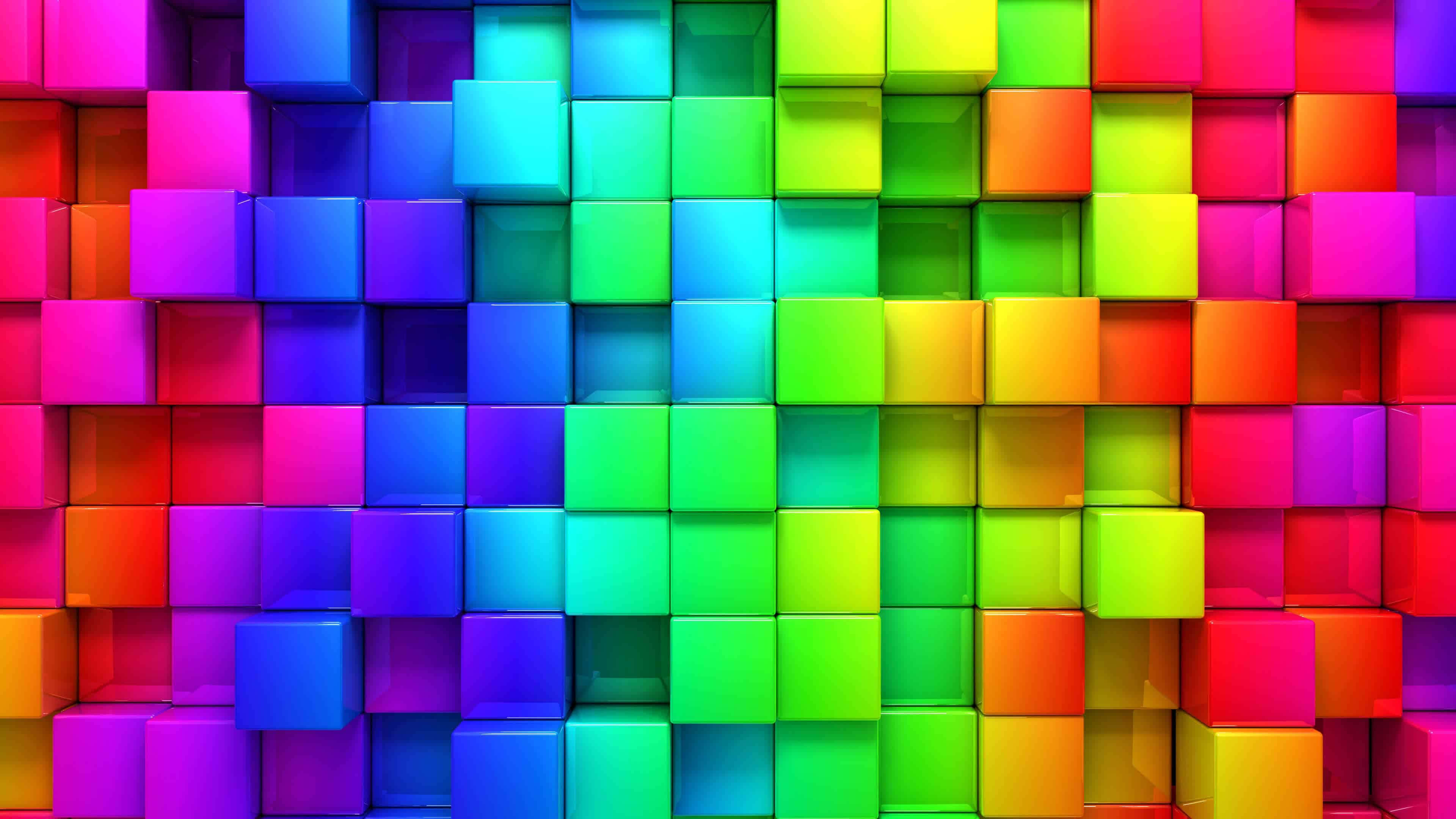Bright Color 桌布 壁紙 — 充滿活力的光澤立方體以彩虹色調形成動態幾何牆，光影變幻。