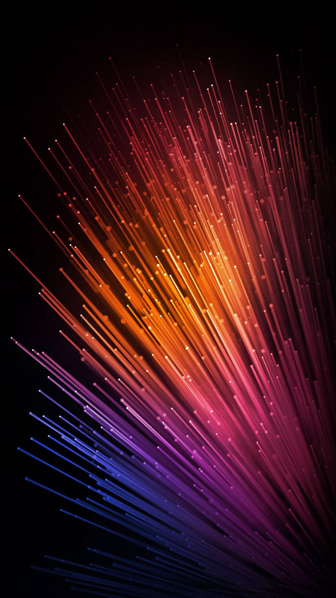 iPhone 12 桌布 壁紙 — 充滿活力的光纖束從黑暗虛空中迸發，呈現紅、橙、粉紅和藍色的絢麗漸變。