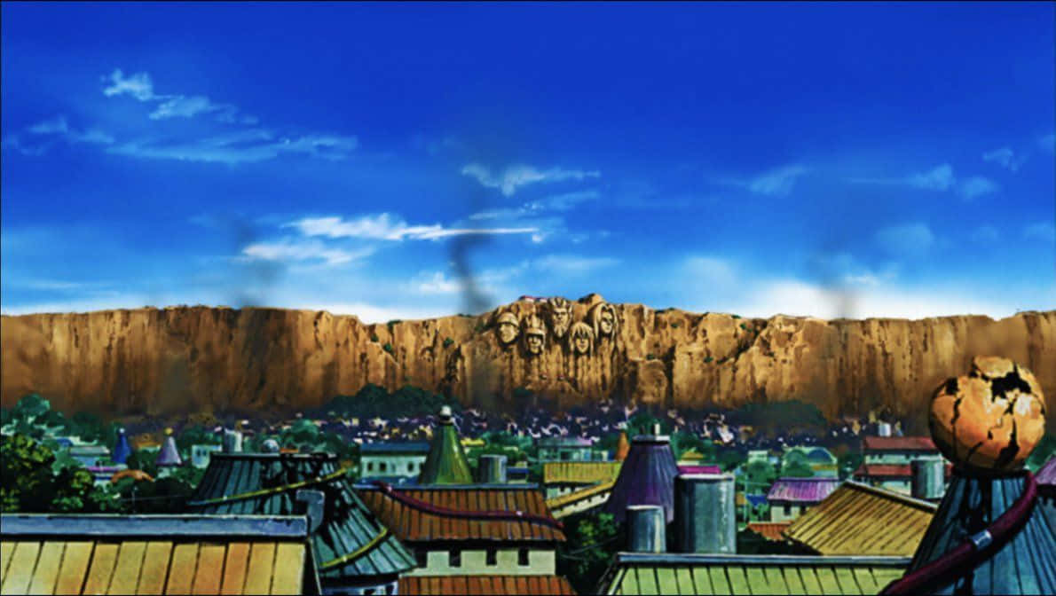 Naruto Village 桌布 壁紙 — 充滿活力的動漫城市景觀，色彩繽紛的屋頂和一個巨大的懸崖，上面刻有面孔，在明亮的藍天下。