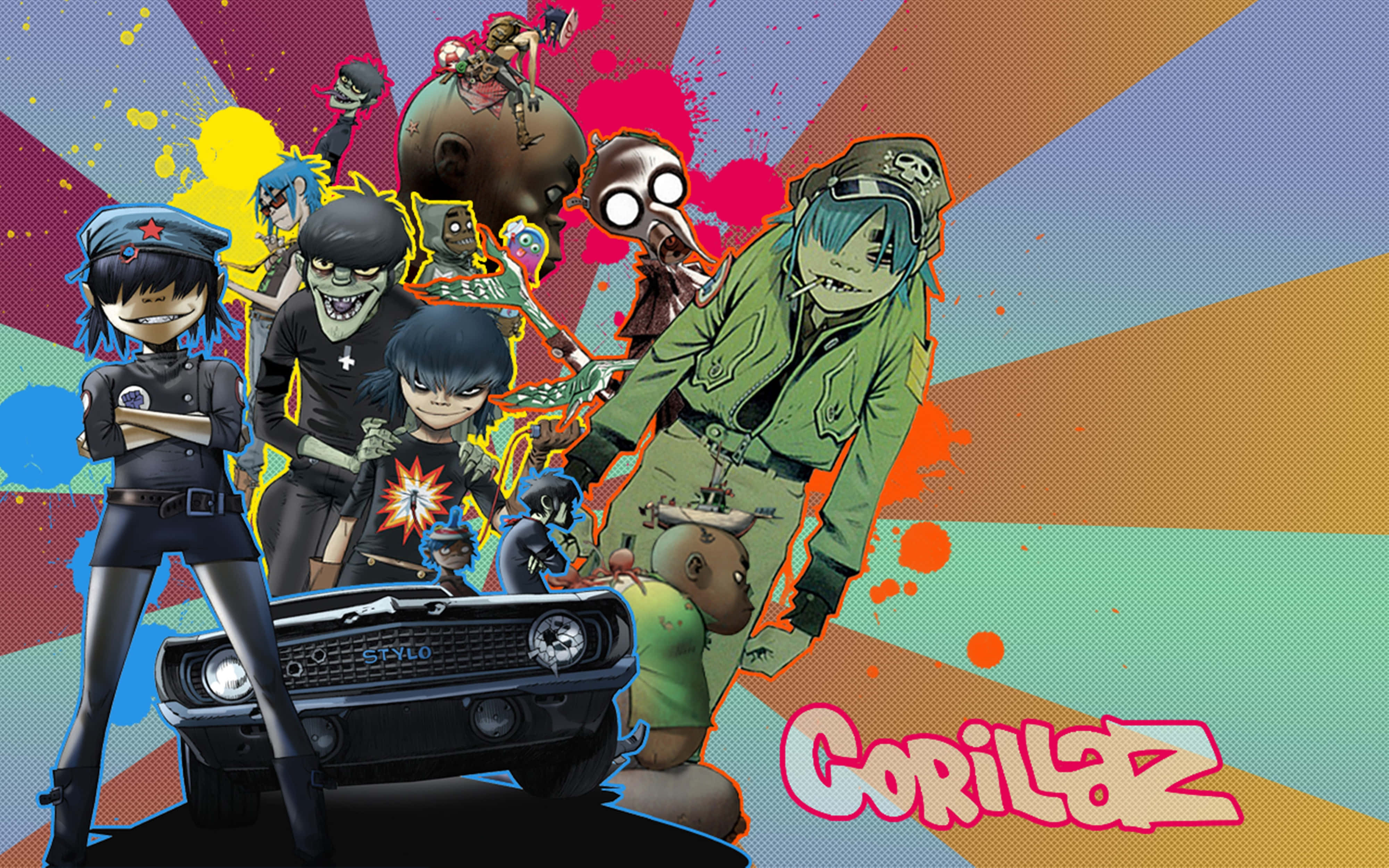 Colorful Aesthetic 桌布 壁紙 — 充滿活力的動漫風格Gorillaz樂團成員在色彩繽紛的放射狀背景前，圍著一輛黑色汽車擺姿勢，背景有油漆飛濺。