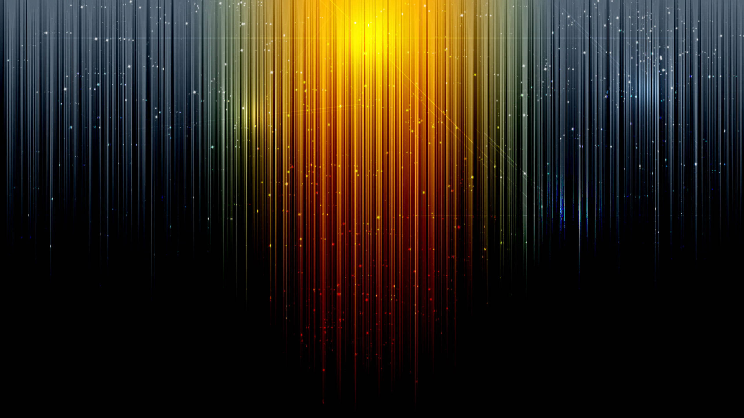 Spectrum 桌布 壁紙 — 充滿活力的垂直光束從發光的金色核心傾瀉而下，映襯著黑暗的背景，閃耀著火熱的橙色和冷藍色調。