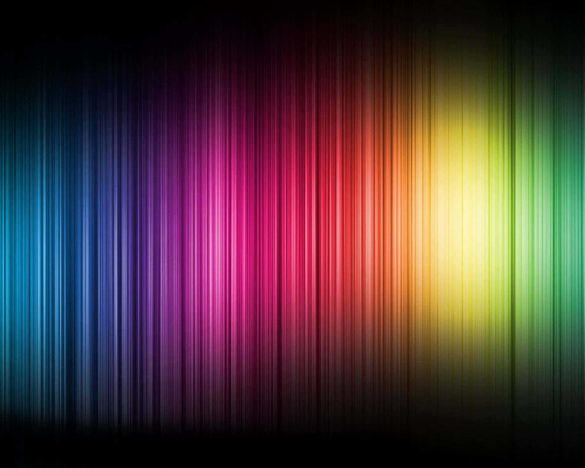 Spectrum 桌布 壁紙 — 充滿活力的垂直彩虹條紋在深色背景上發光，營造出動態多彩的漸變效果。