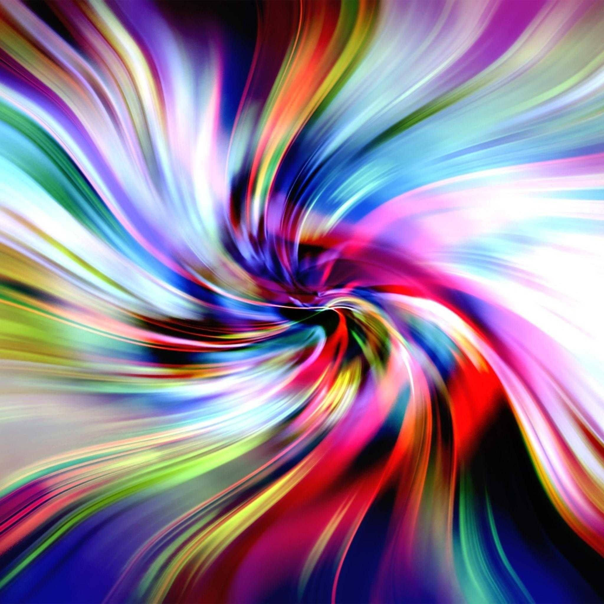 Multicolor 桌布 壁紙 — 充滿活力的多色條紋旋轉成動態漩渦，營造出迷幻的動態模糊效果。
