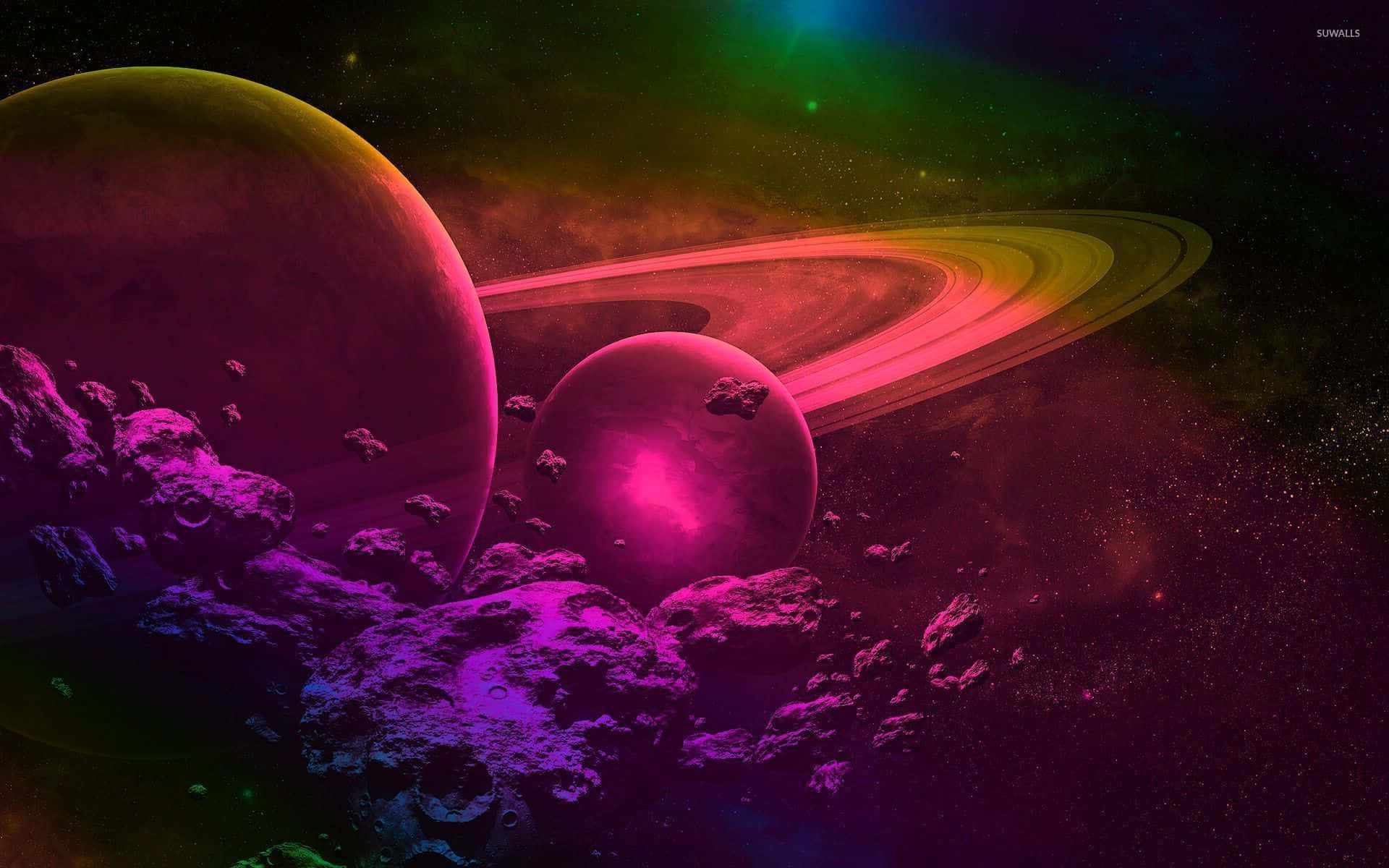 桌布 壁紙 — 充滿活力的宇宙場景，發光的粉紅色和紫色行星被色彩繽紛的光環和漂浮的小行星環繞，背景是星光熠熠的星雲。
