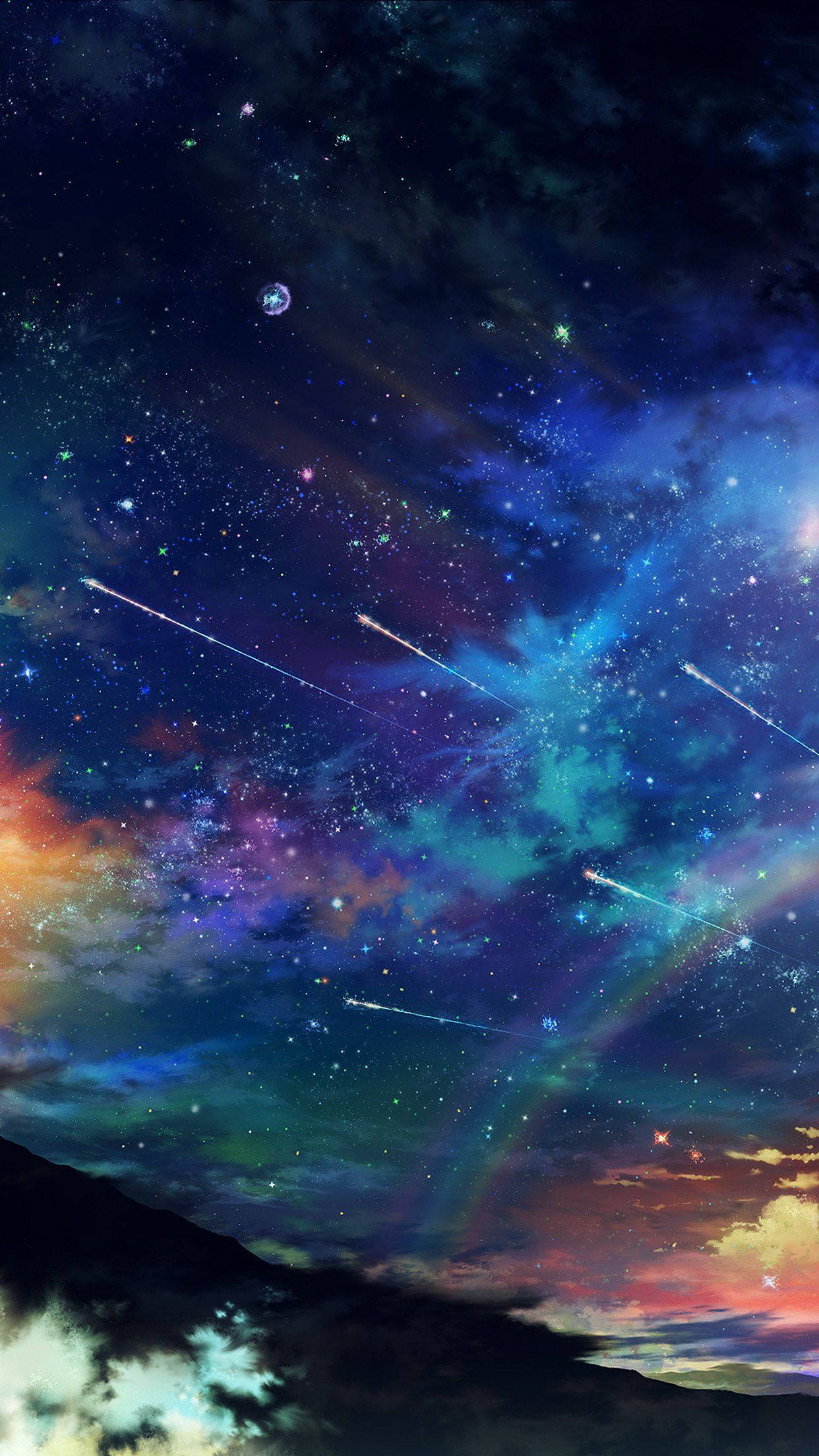 Star Space 桌布 壁紙 — 充滿活力的宇宙天空，流星劃過充滿發光星星和彩色雲層的星雲，上方是黑暗的山脈輪廓。