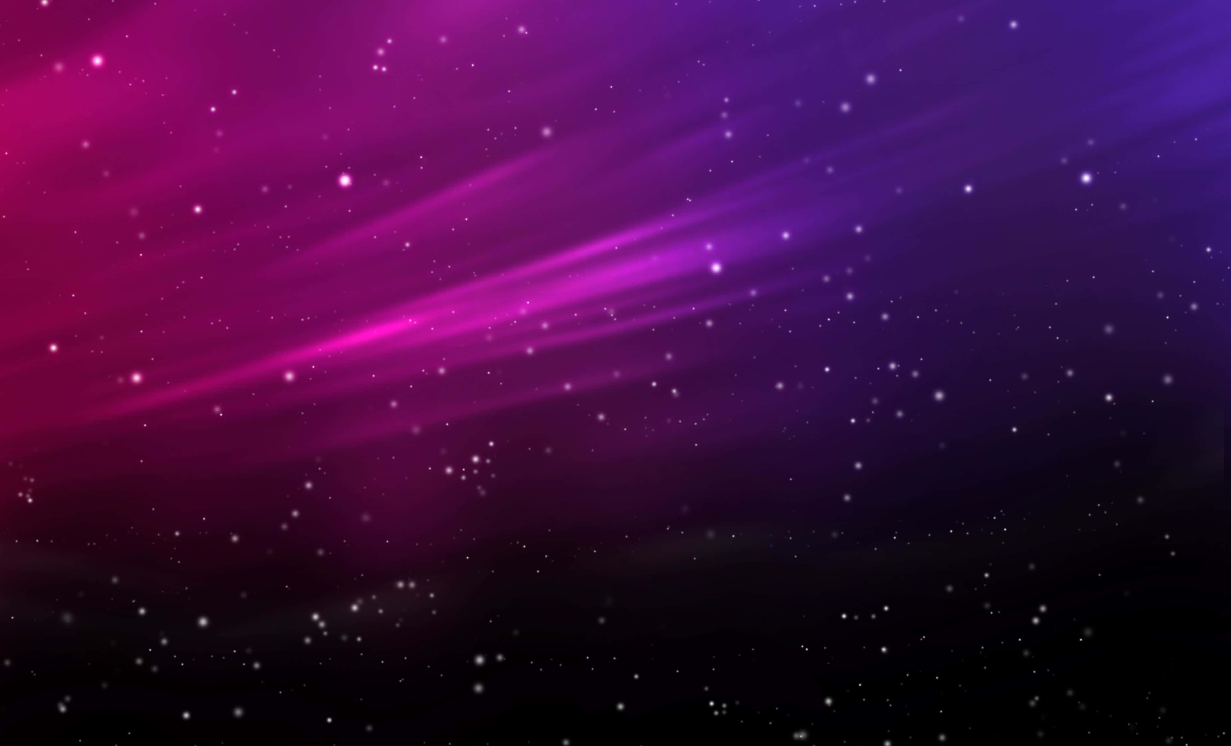 images 桌布 壁紙 — 充滿活力的宇宙射線劃過漸變紫色和洋紅色的星場，散落著發光的粒子。