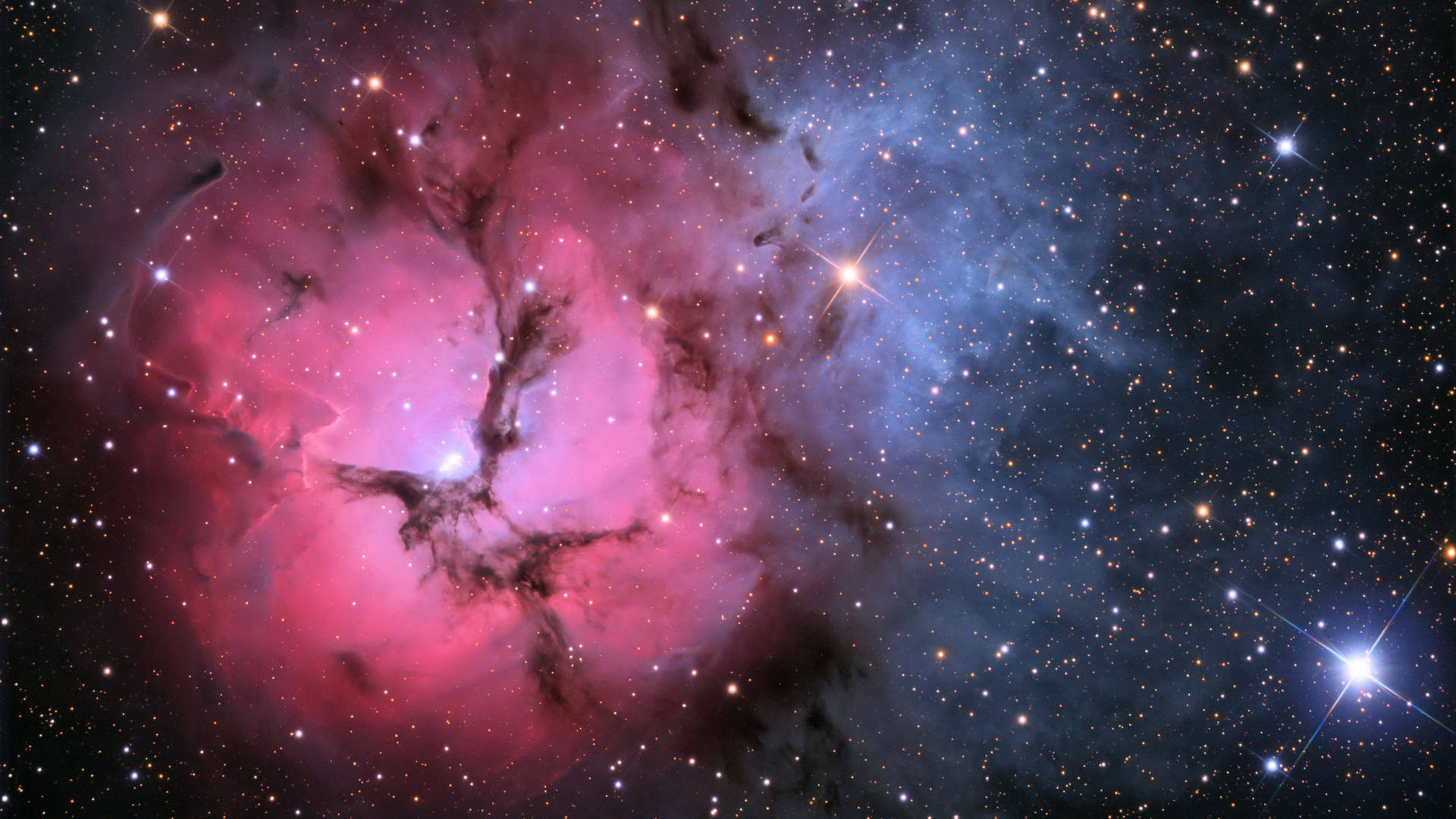 深空中帶有發光星星的充滿活力的粉紅色和藍色星雲。 — 星雲 GIF 壁紙
