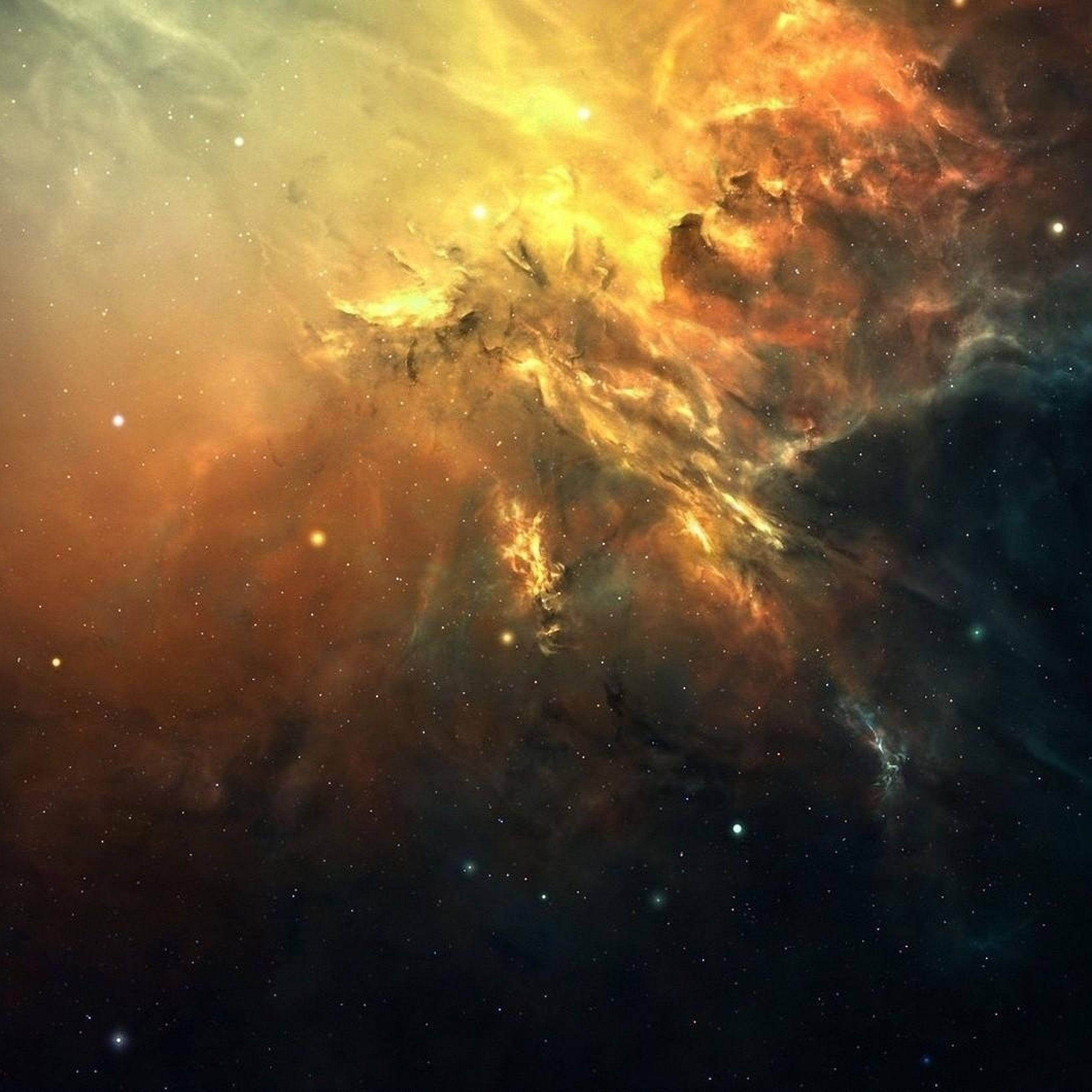 iPad Pro 桌布 壁紙 — 充滿活力的宇宙星雲以火熱的橙色、黃色和深藍色在星空中旋轉。