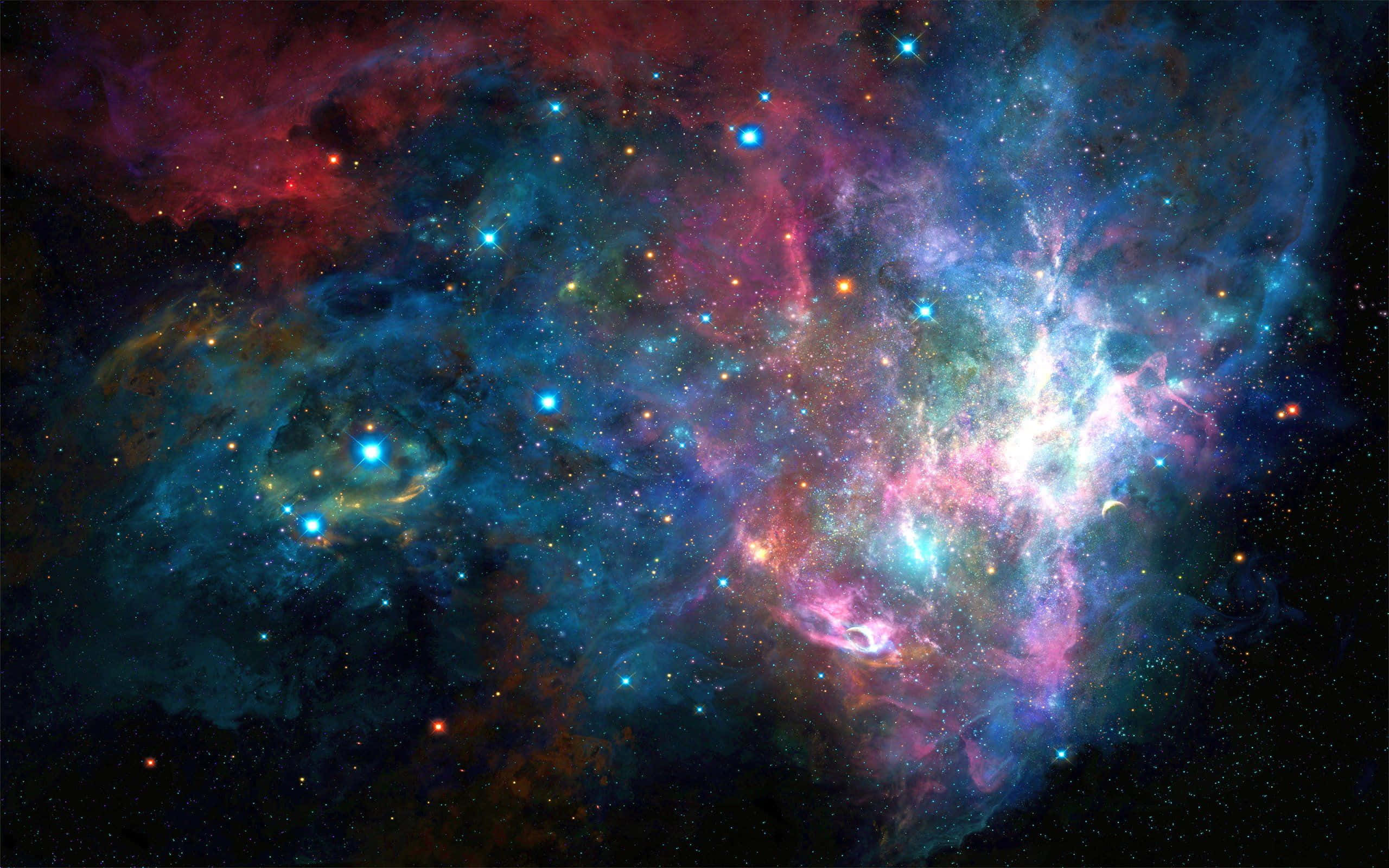 Beautiful Galaxy 桌布 壁紙 — 充滿活力的宇宙星雲在佈滿星星的黑色虛空中以電光藍、粉紅和紅色旋轉。