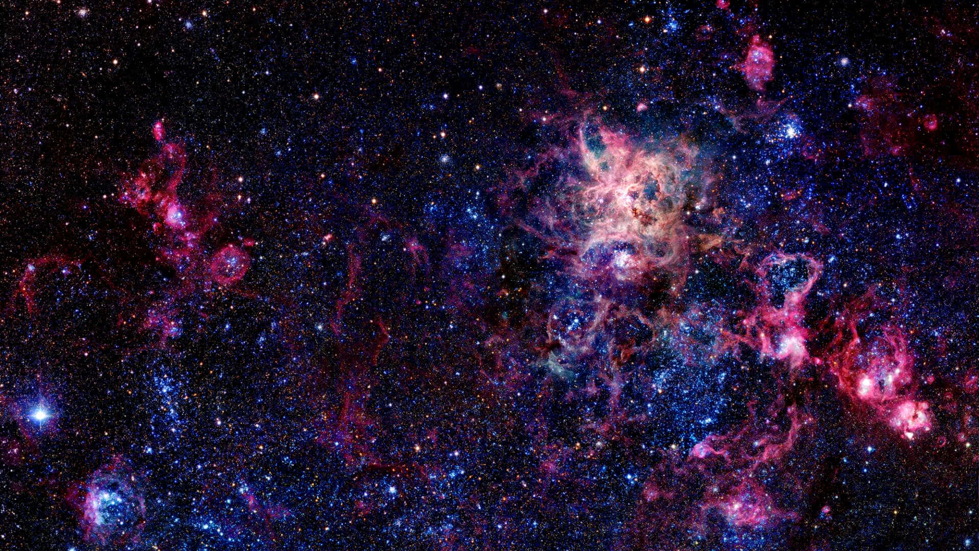 1920 X 1080 Nebula 桌布 壁紙 — 充滿活力的宇宙星雲在星光點點的黑色虛空中散發出電光粉紅和深藍色的光芒。