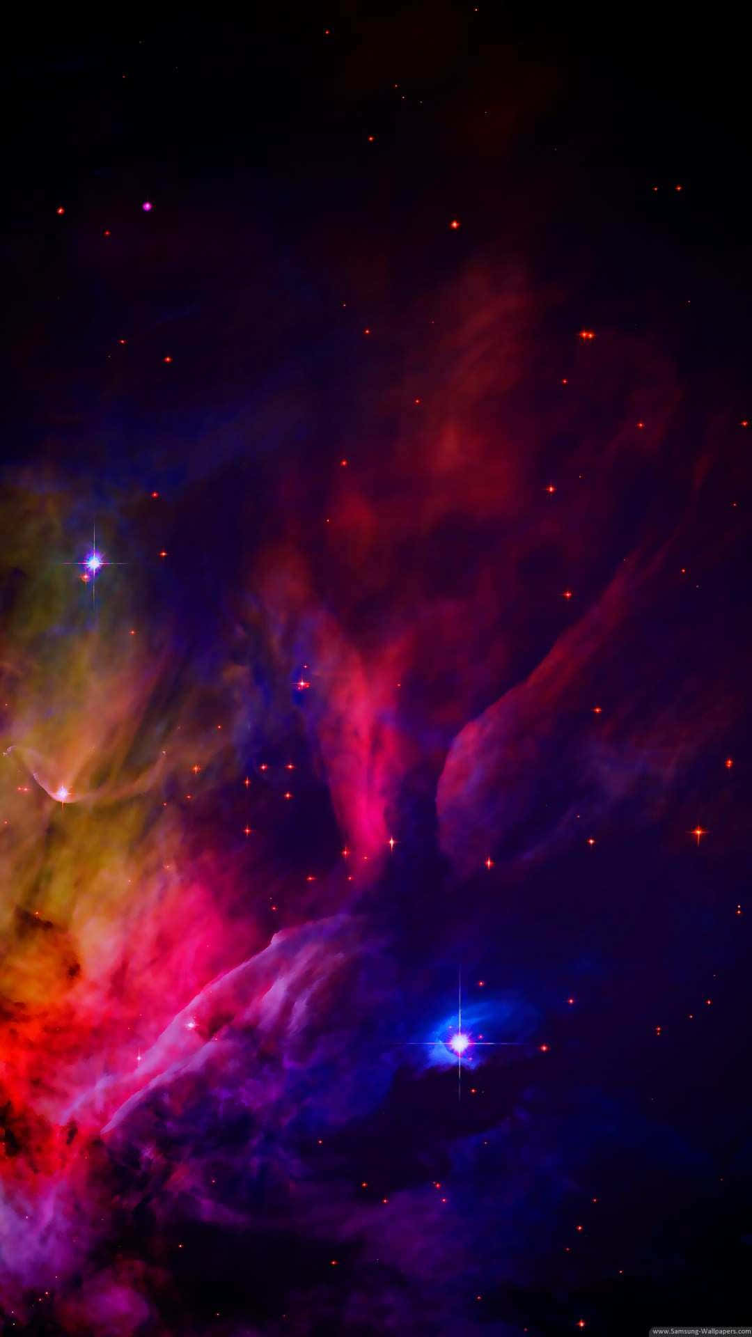 桌布 壁紙 — 充滿活力的宇宙星雲在星空背景下以電光紅、紫和藍色旋轉。