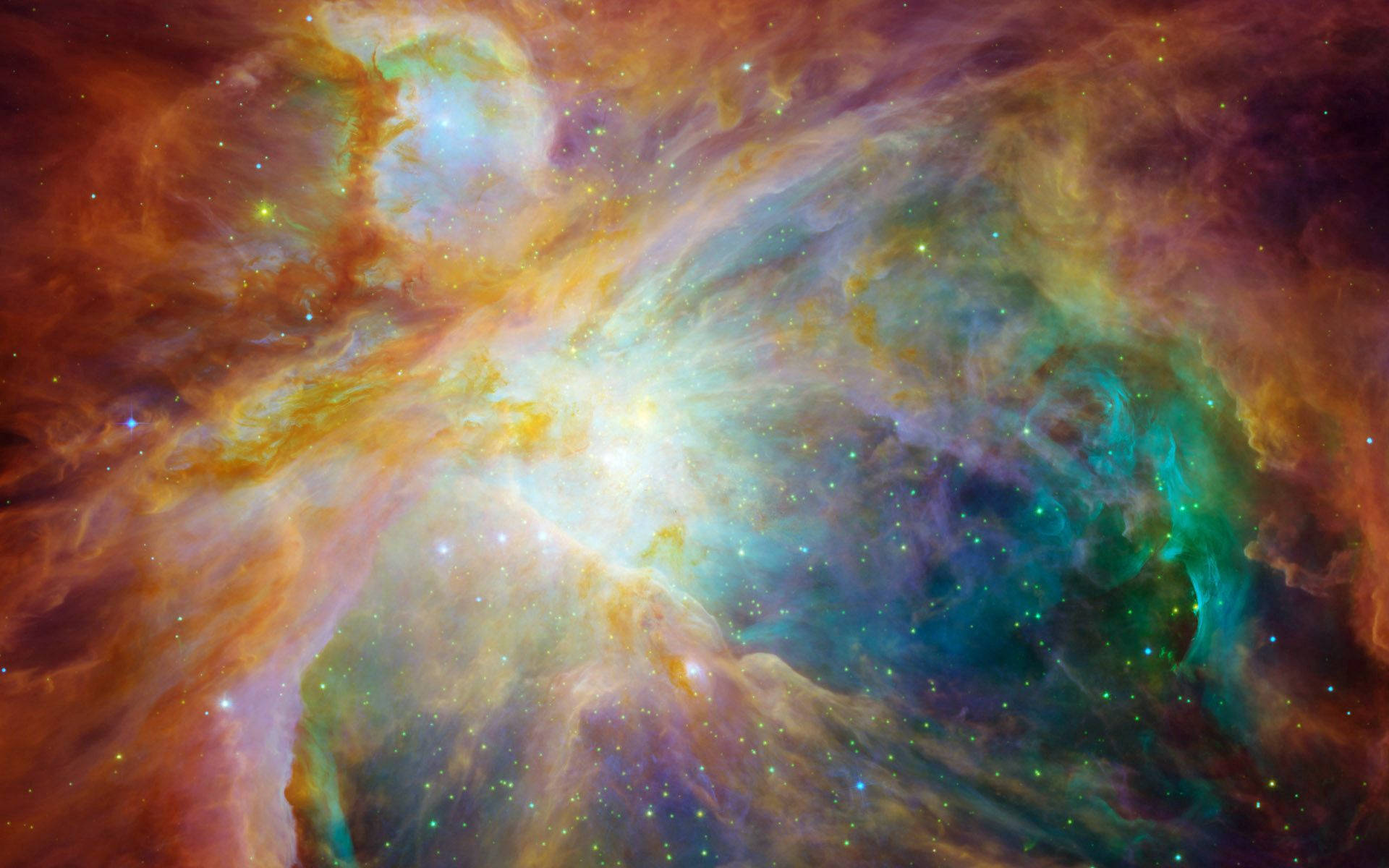 深藍色 桌布 壁紙 — 充滿活力的宇宙星雲在熾熱的橙色和冷色調的青色中旋轉，閃爍的星星散落在深空。