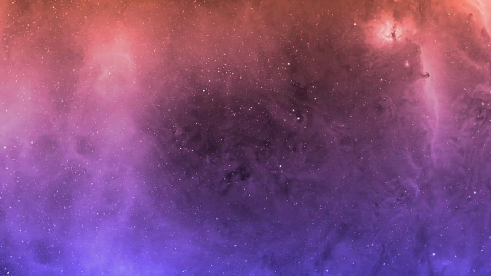 Interactive 桌布 壁紙 — 充滿活力的宇宙星雲在粉紅色、紫色和藍色中旋轉，閃爍的星星散落在深邃的太空中。
