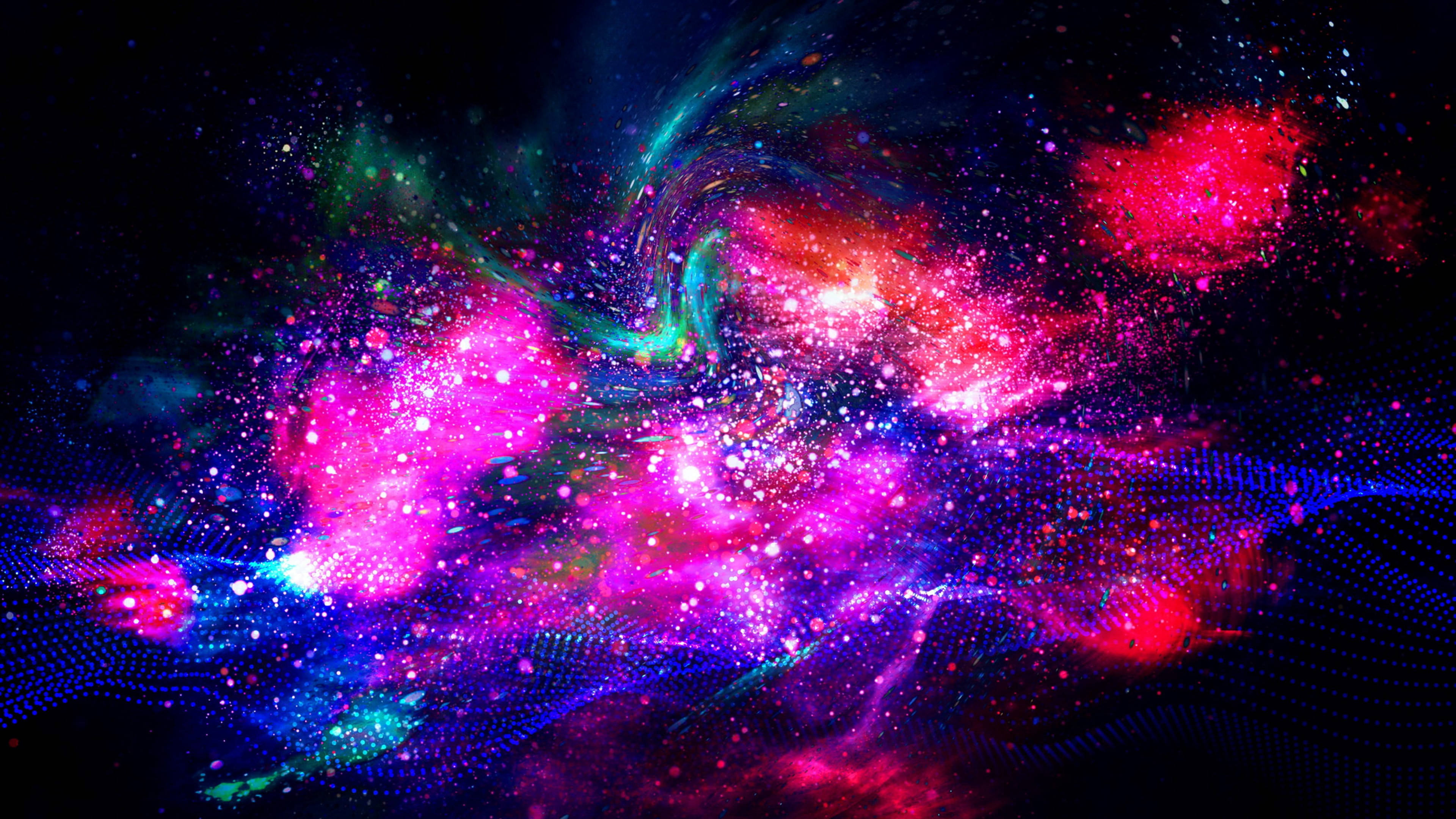 宇宙 桌布 壁紙 — 充滿活力的宇宙星雲在黑暗的數位太空背景中旋轉，帶有粉紅色、藍色和綠色的發光粒子。