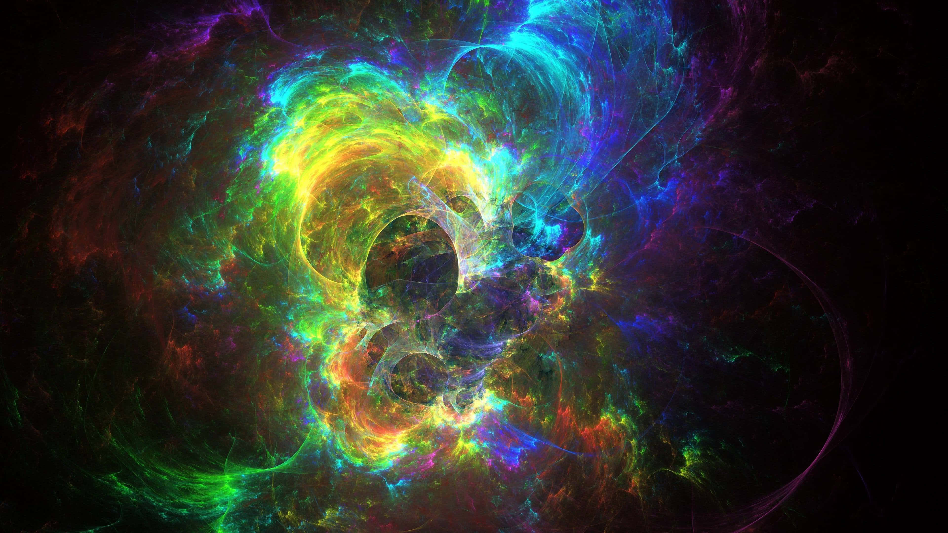太空 桌布 壁紙 — 充滿活力的宇宙星雲在黑暗虛空中旋轉，呈現電光藍、綠色和火熱黃色。